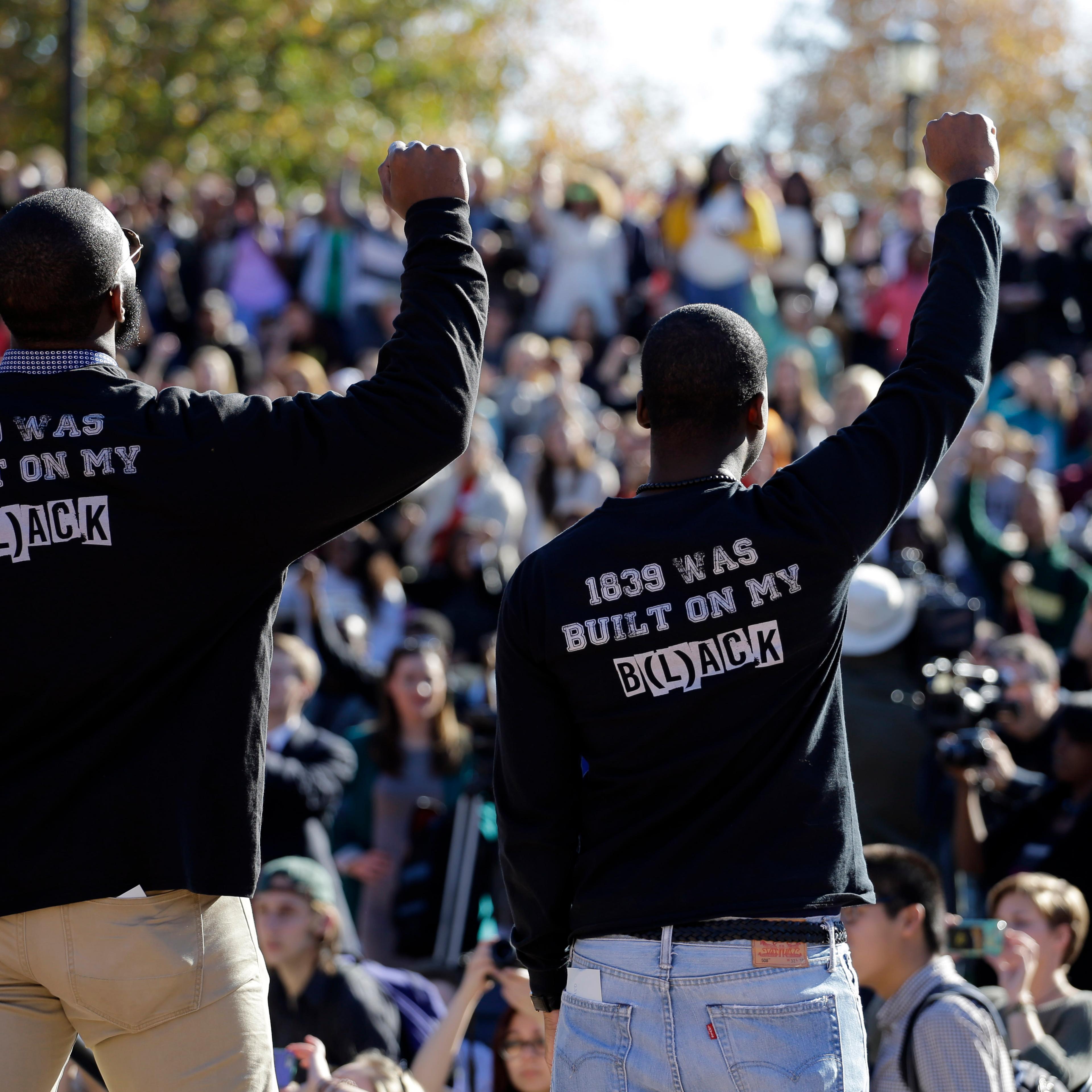 Members of the black student protest group, Concerned Student 1950, at the University of Missouri-Columbia in Columbia, Mo. on Nov. 9, 2015.