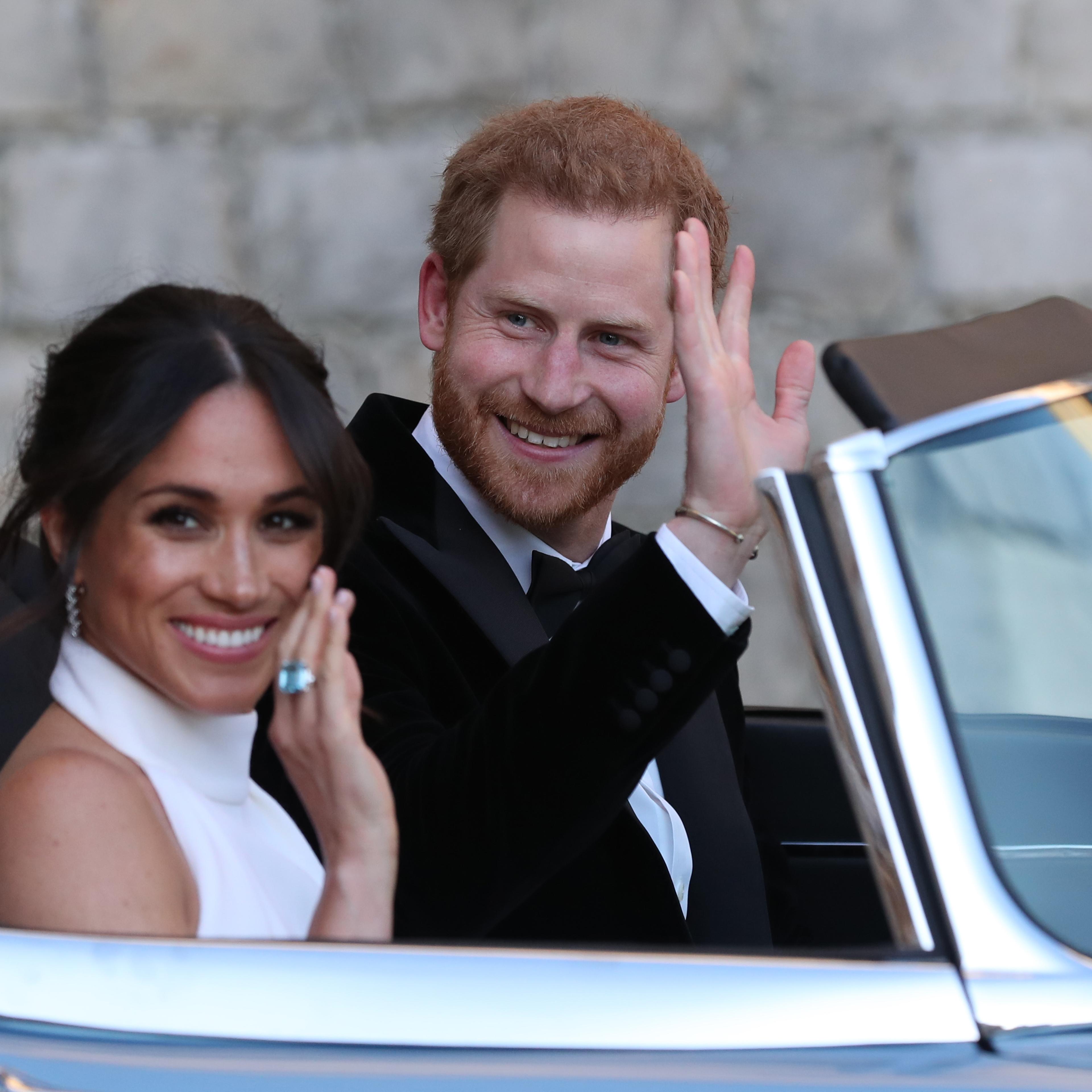 Meghan Markle and Prince Harry leave for royal wedding reception