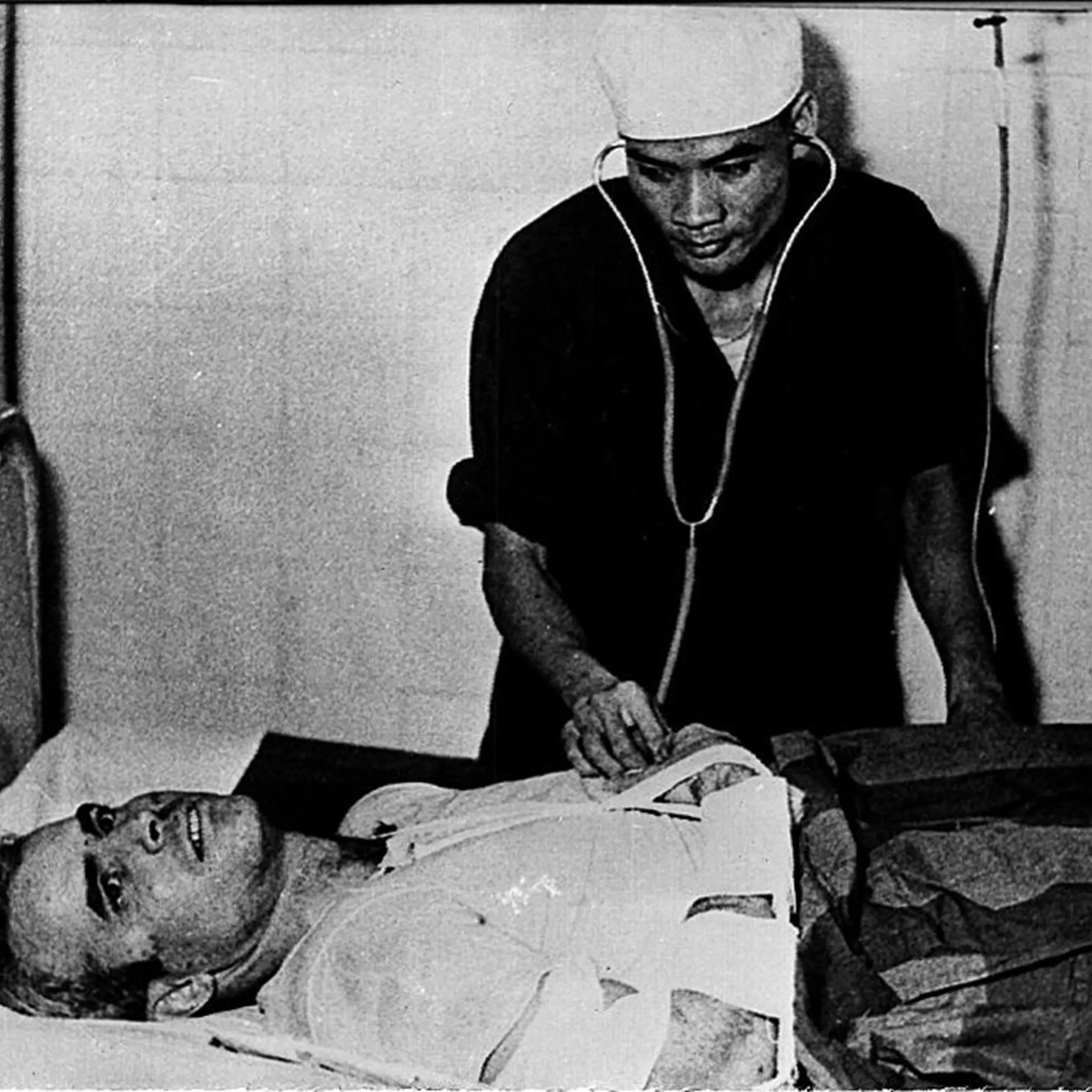 McCain being examined by a doctor