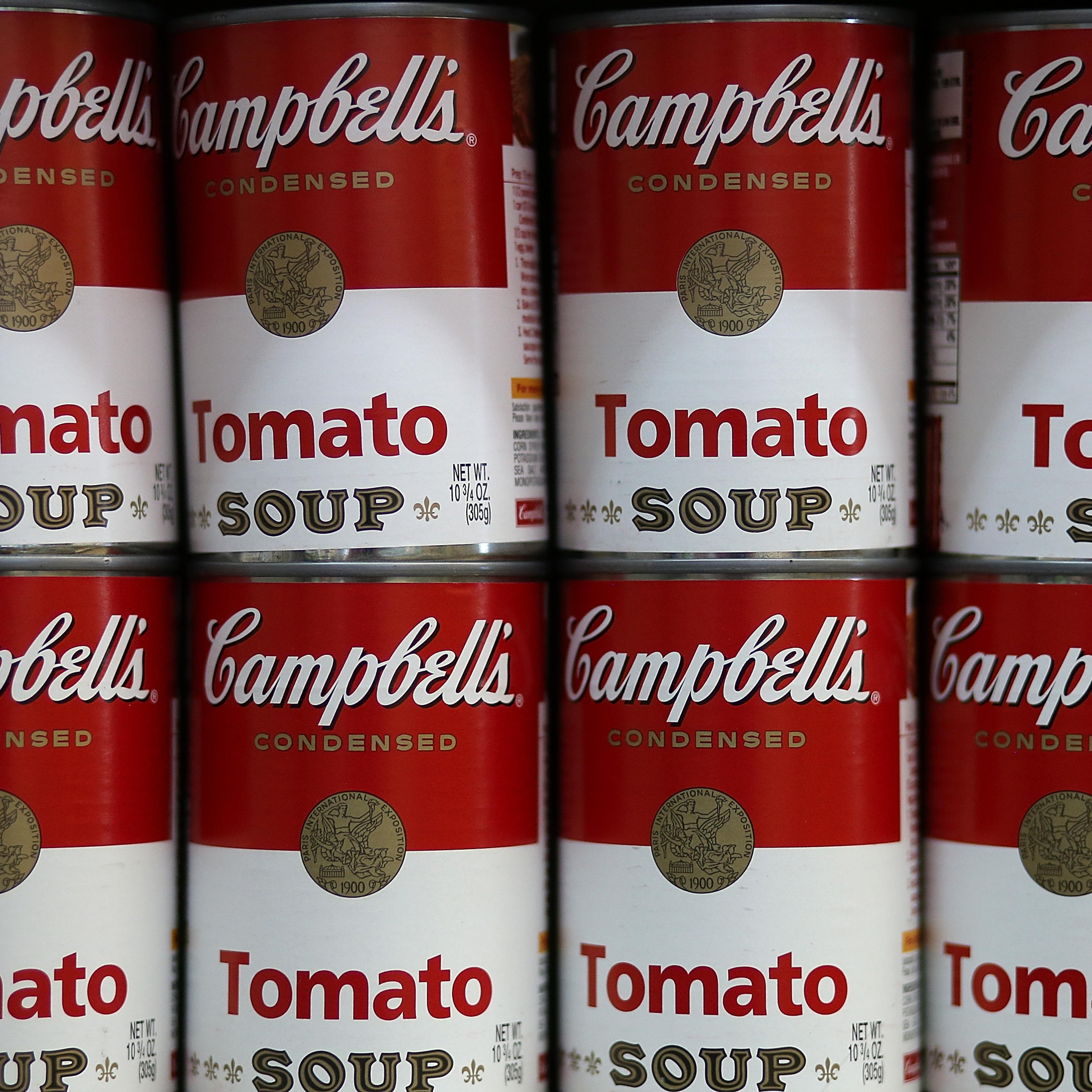 Cans of Campbell's tomato soup are displayed on a shelf at Santa Venetia Market on May 20, 2013 in San Rafael, California.