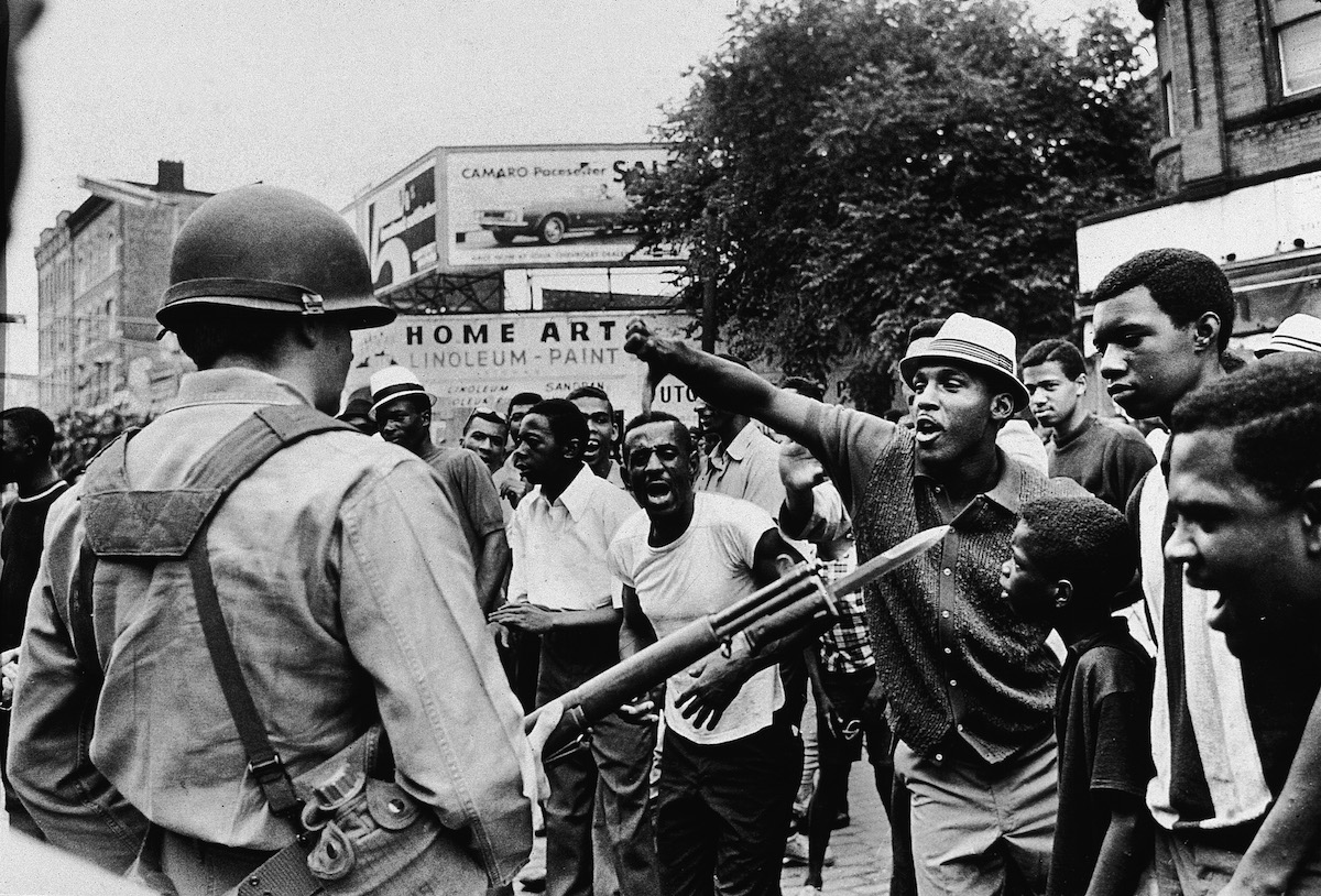 Man Gives Black Power Salute To National Guard