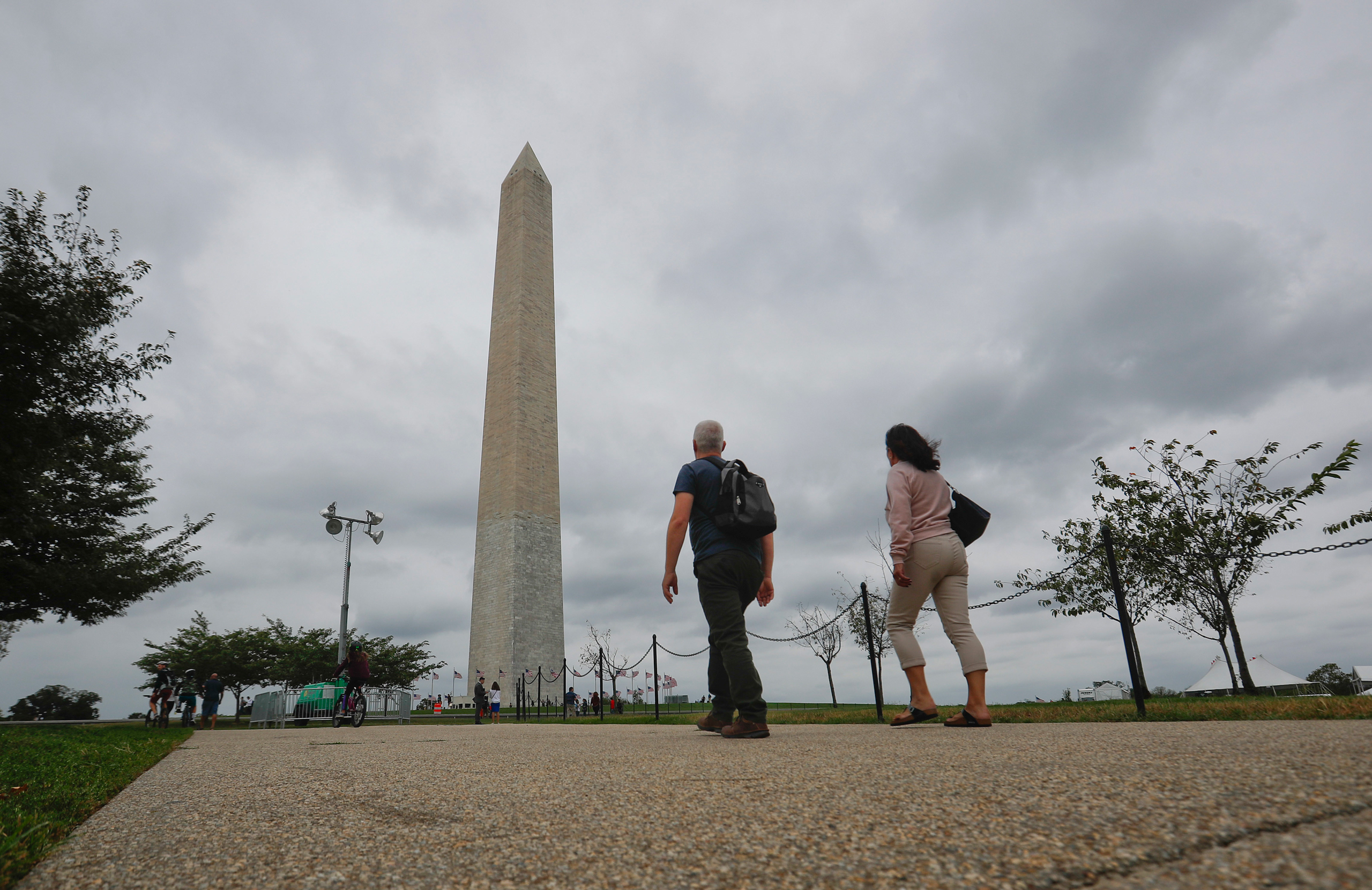 Visitors walks toward the Washington Monument on the National Mall in Washington, Monday, Sept. 26, 2016. Elevator trouble closes Washington Monument indefinitely the National Park Service says the Washington Monument will be closed indefinitely because 