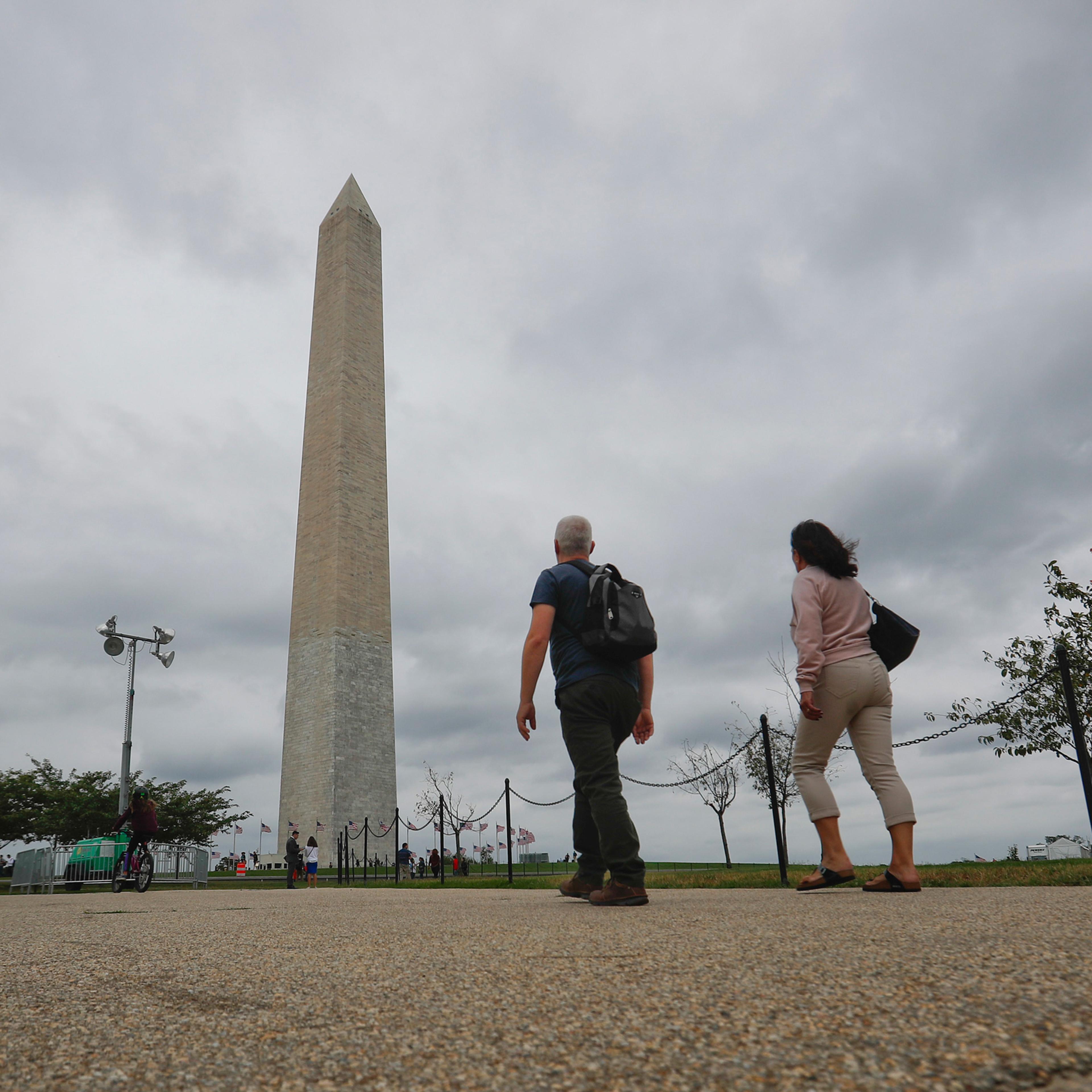 Visitors walks toward the Washington Monument on the National Mall in Washington, Monday, Sept. 26, 2016. Elevator trouble closes Washington Monument indefinitely the National Park Service says the Washington Monument will be closed indefinitely because