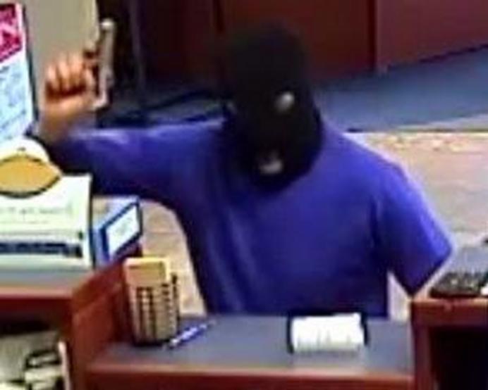 A handout provided by the FBI on Dec. 5, 2016 shows the Packing Pigeon Bandit, wanted for bank robbery, in Glendale, AZ.
