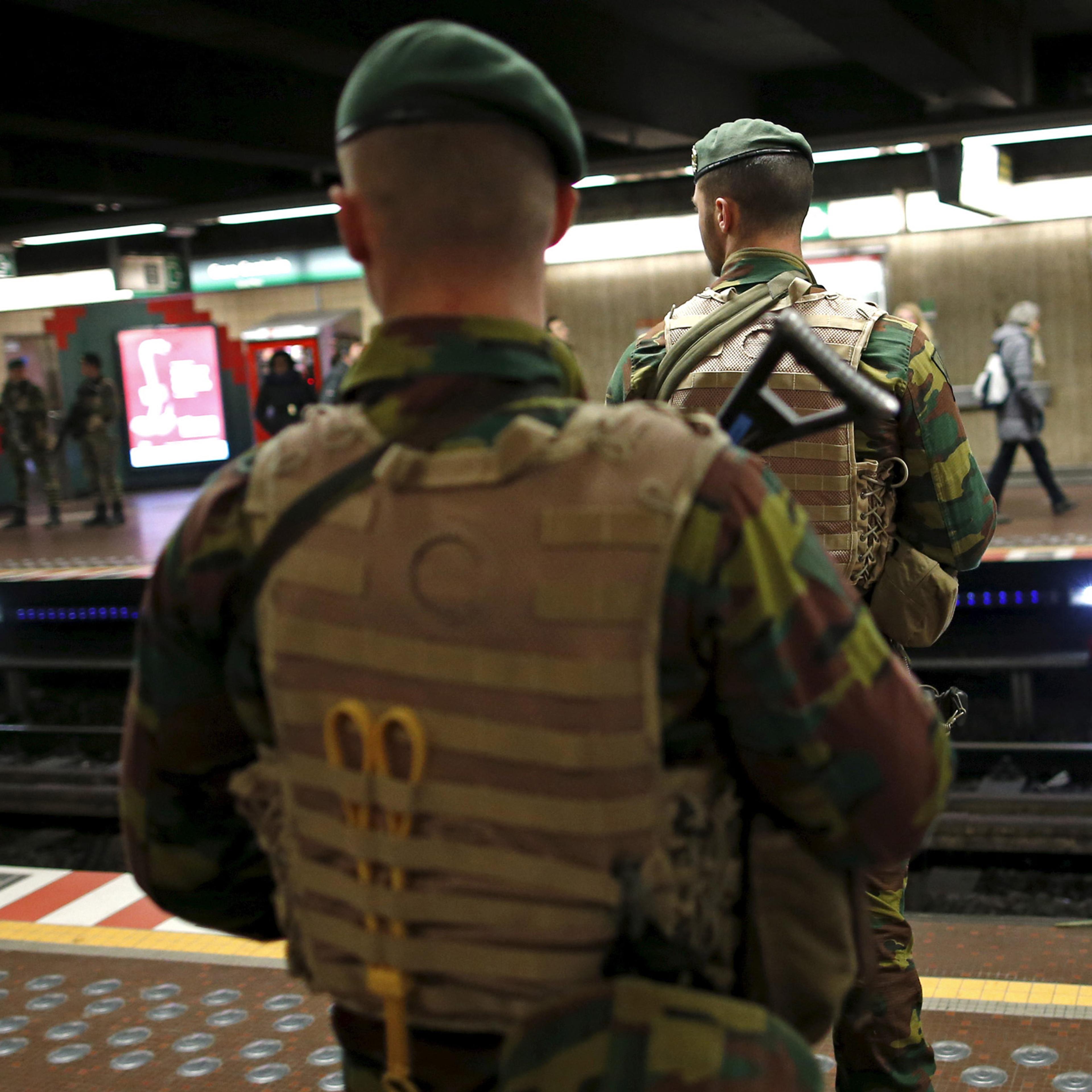 Belgian soldiers patrol at the Central Station subway stop in Brussels