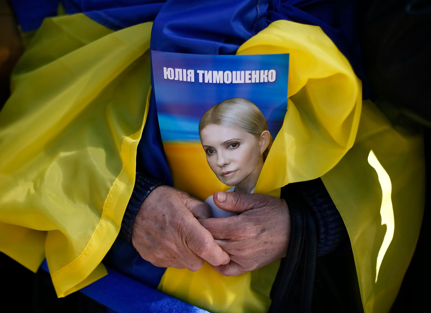 A supporter of Ukrainian politician and former prime minister Yulia Tymoshenko in central Kiev, March 29, 2014. If she is elected President, Tymoshenko has pledged to fight corruption, as have most of the candidates who have put forward a platform for th