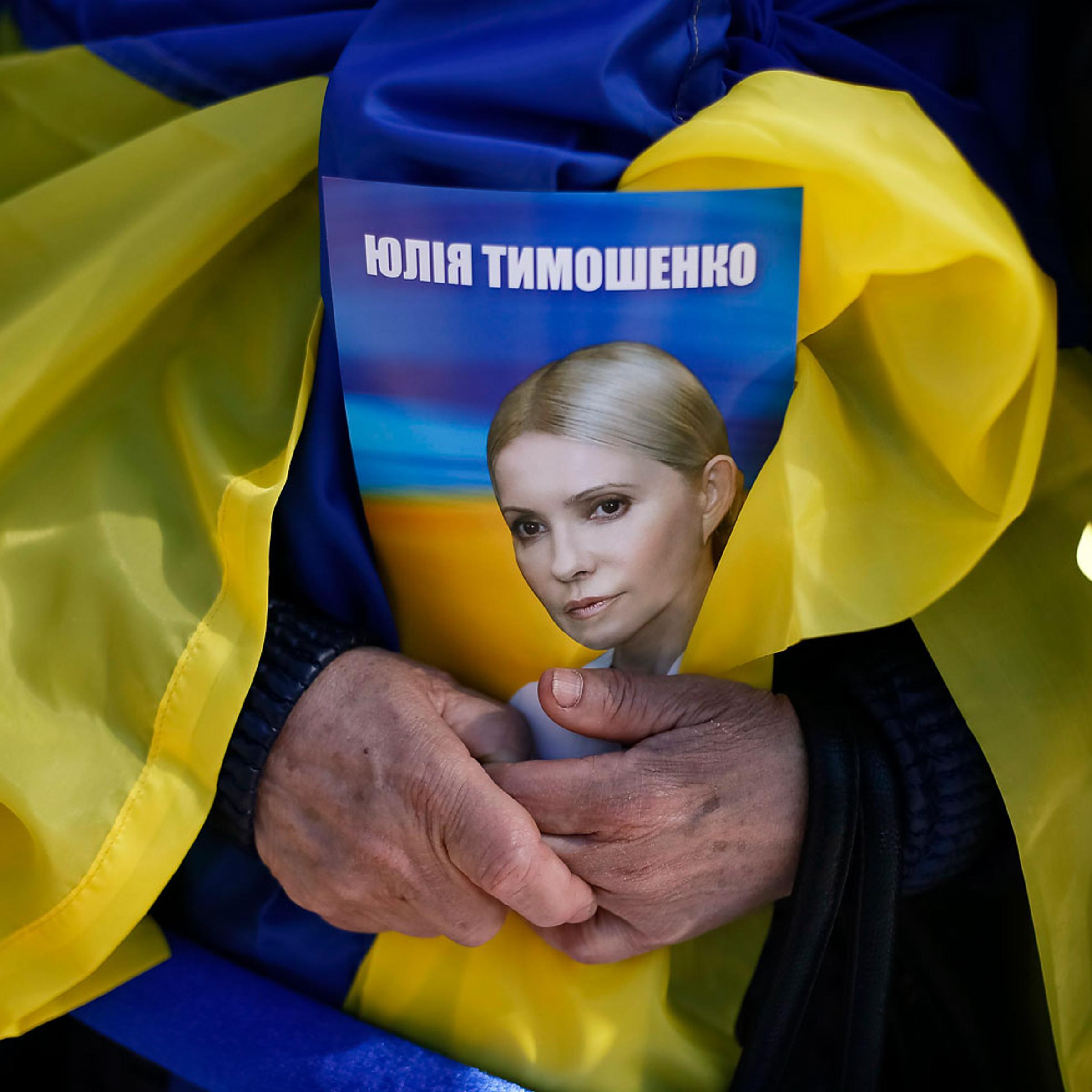 A supporter of Ukrainian politician and former prime minister Yulia Tymoshenko in central Kiev, March 29, 2014. If she is elected President, Tymoshenko has pledged to fight corruption, as have most of the candidates who have put forward a platform for th