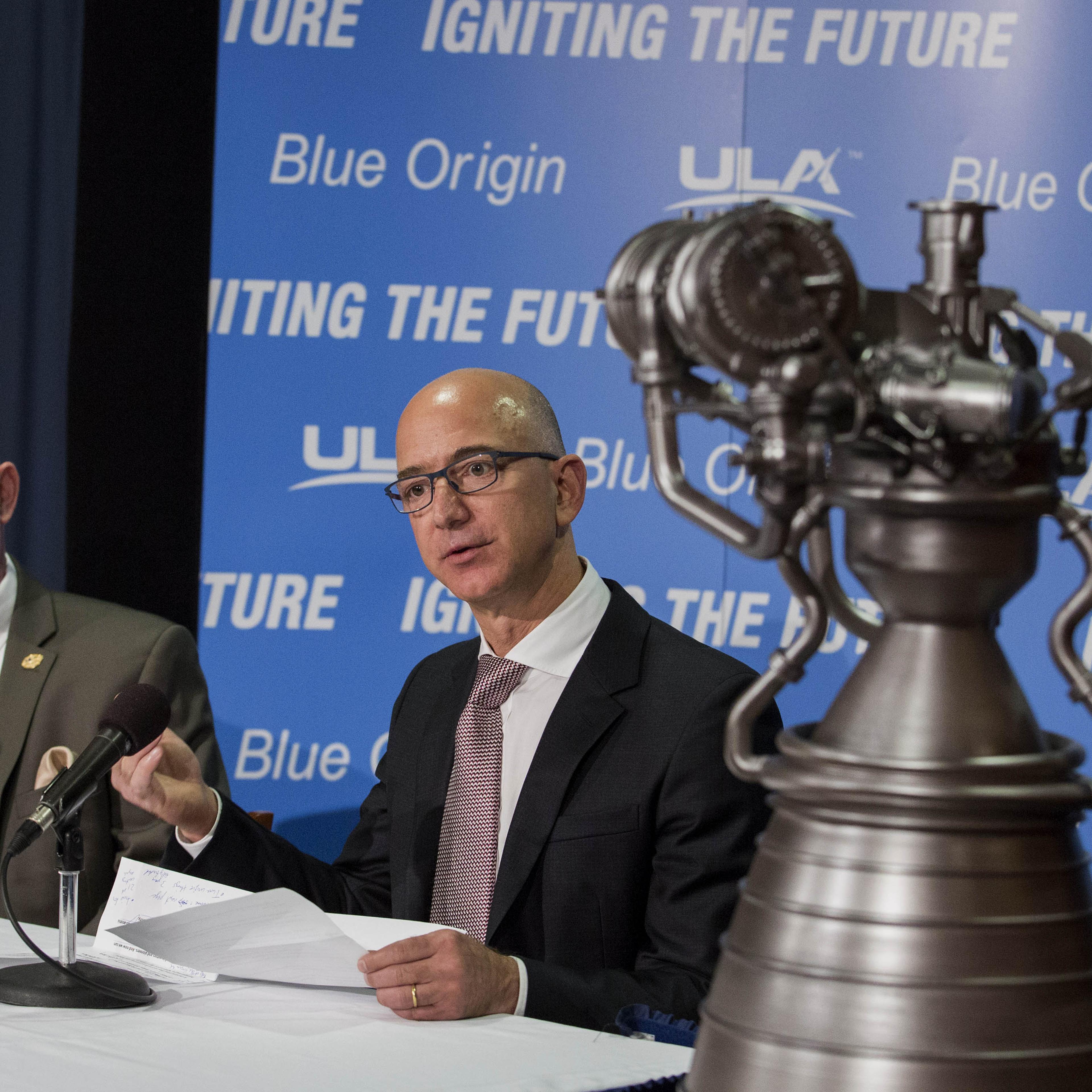 Lost is space? Bezos (right) and ULA chief Tory Bruno show off the goods on Sept. 17, 2014 in Washington.