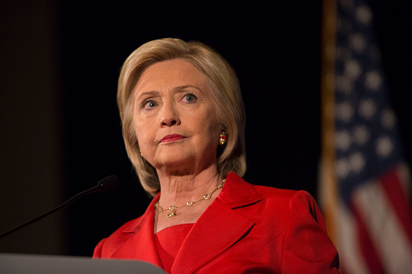 Hillary Clinton, former U.S. secretary of state and 2016 Democratic presidential candidate, pauses while speaking during the Iowa Democratic Party Hall of Fame Celebration dinner in Cedar Rapids, Iowa, U.S., on Friday, July 17, 2015.