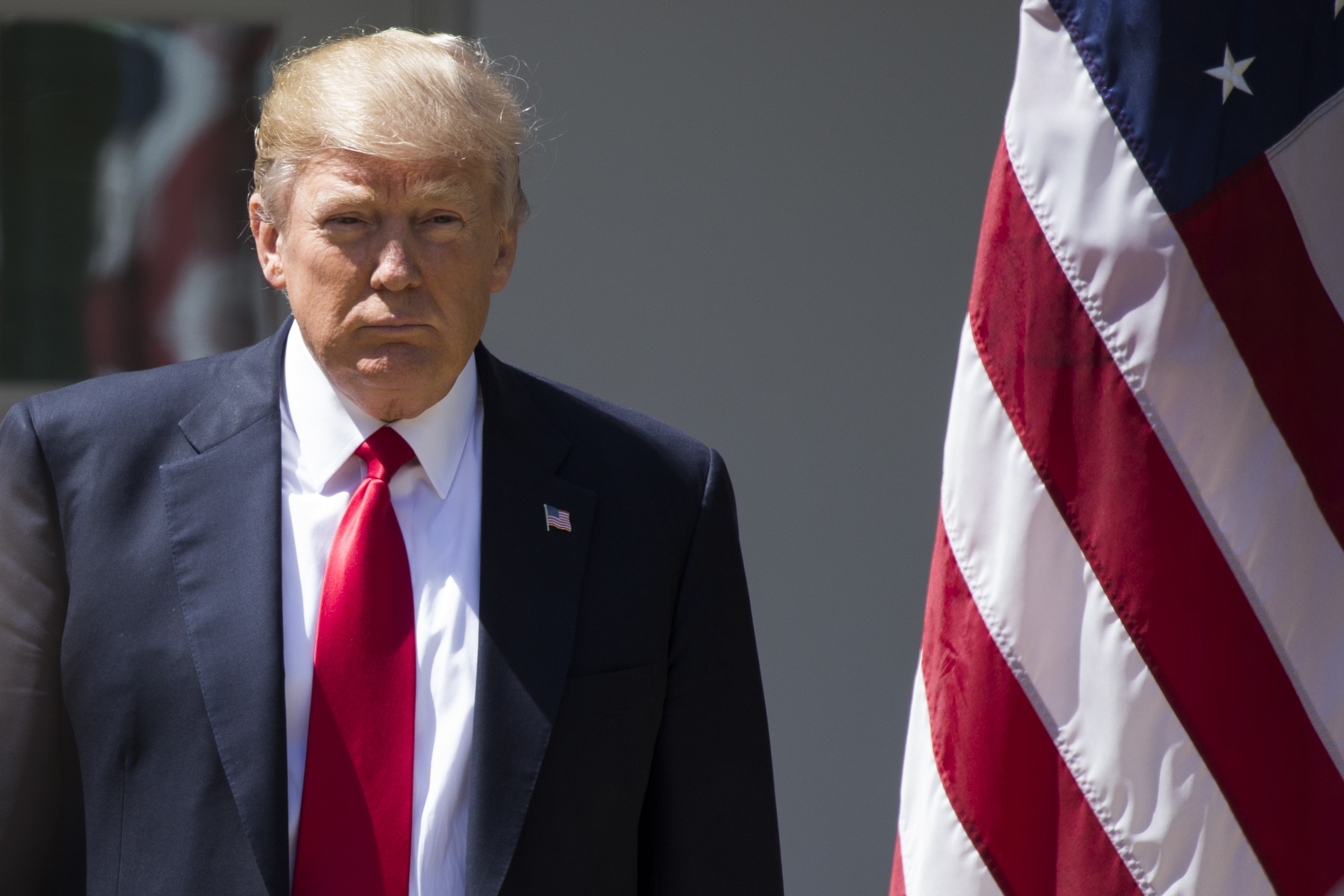 U.S. President Donald Trump walks to the podium with King Abdullah II bin al-Hussein of Jordan (not seen) for a joint press conference in the Rose Garden of the White House in Washington, USA on April 5, 2017.
