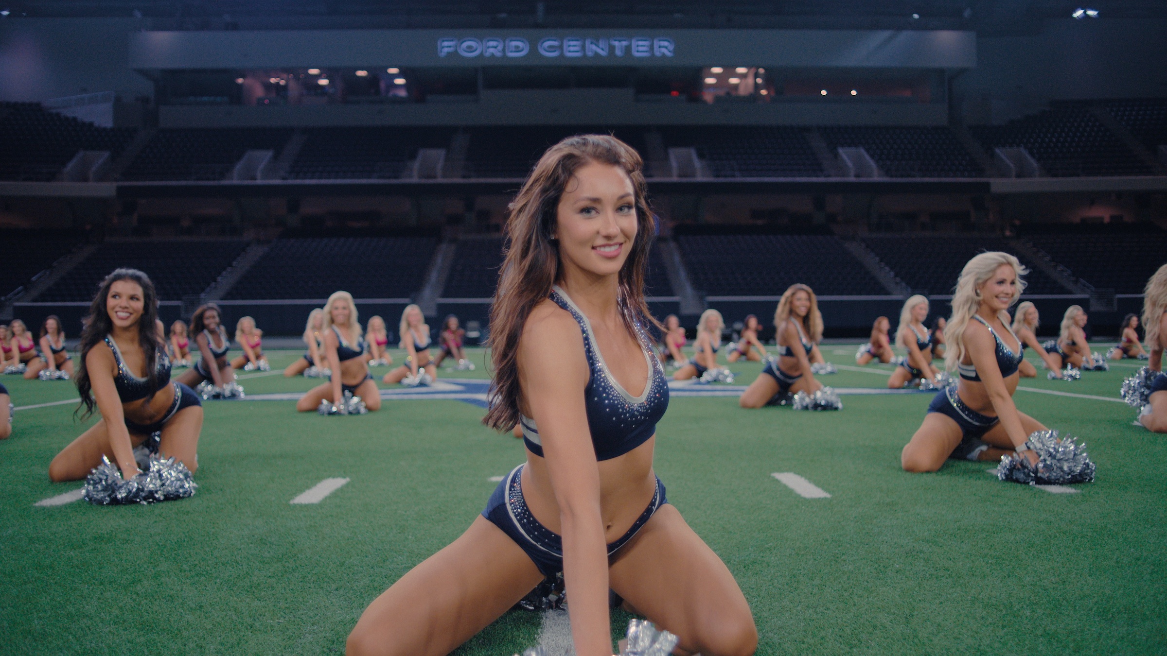 America's Sweethearts: Dallas Cowboys Cheerleaders. (Center) Kelcey in America's Sweethearts: Dallas Cowboys Cheerleaders. Cr. Courtesy of Netflix © 2024