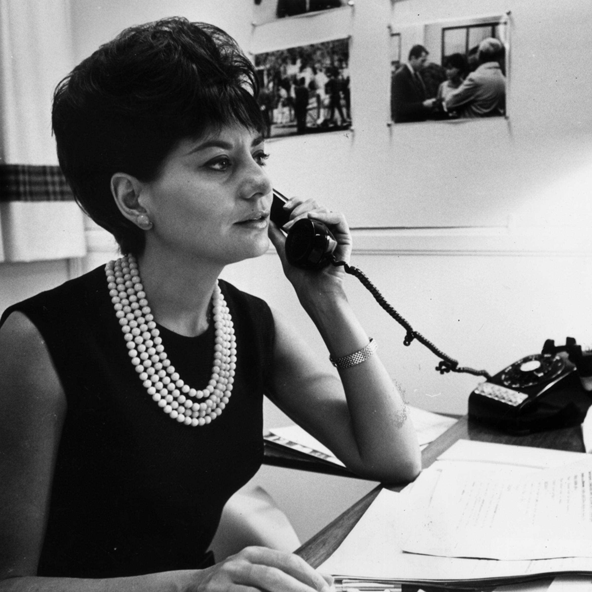 NBC's Barbara Walters takes a phone call at her desk in New York City, circa 1964.