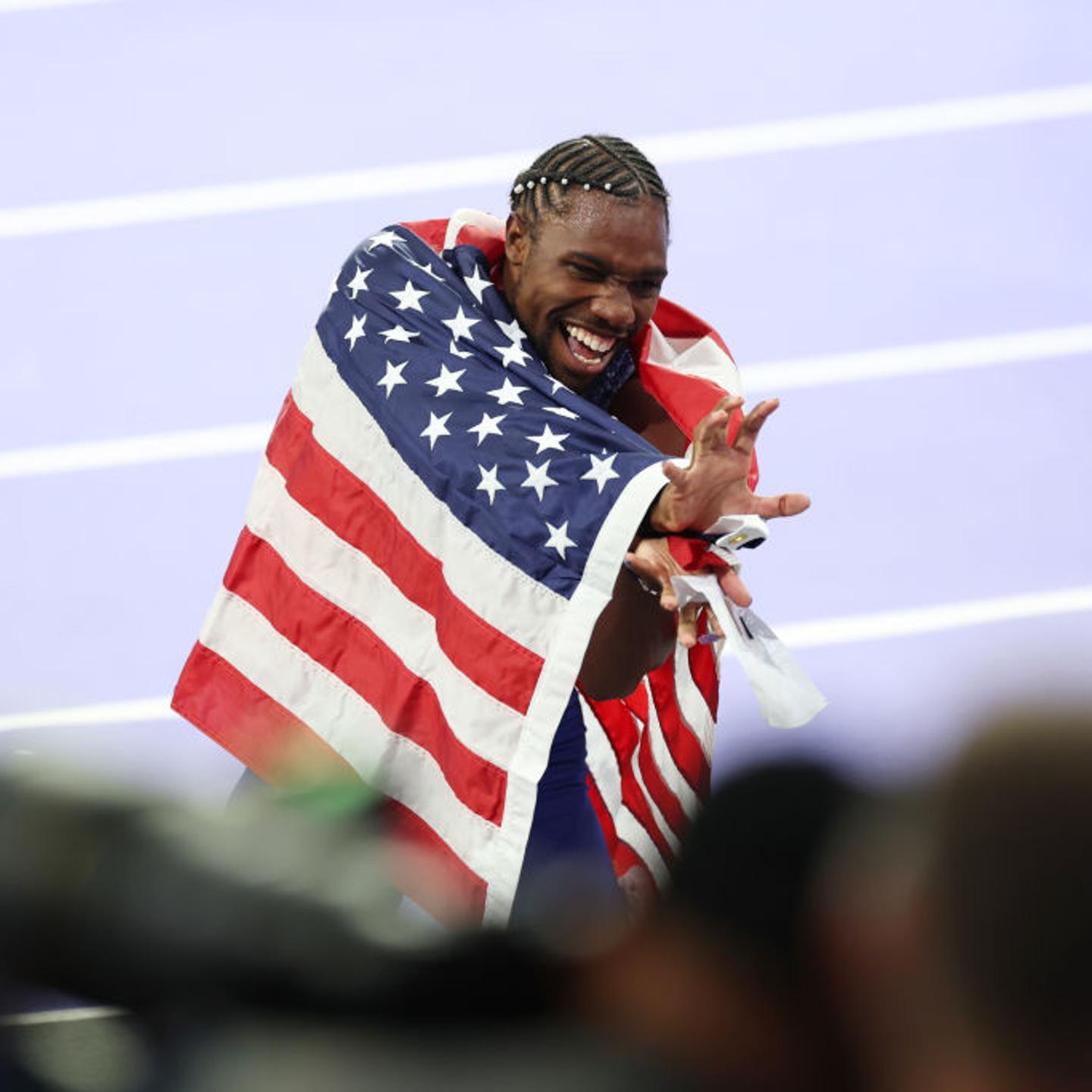 Noah Lyles of Team celebrates after winning the Men's 100m Final on at Stade de France in Saint-Denis, France, on August 4, 2024.