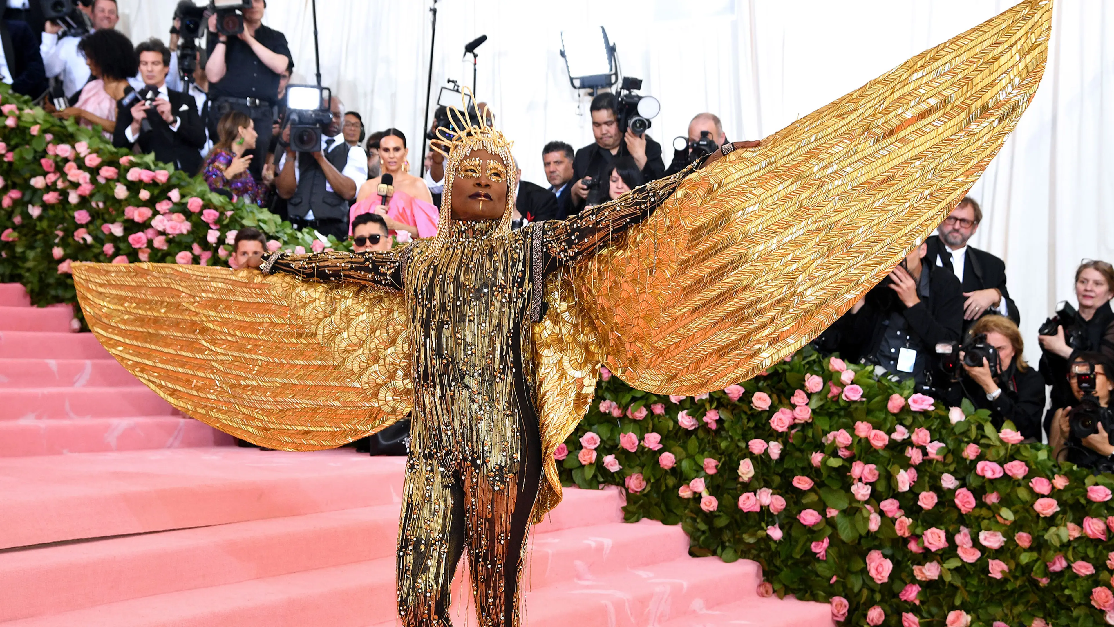 billy porter gold dress Billy Porter shines in 24k gold feathers at Oscars red carpet