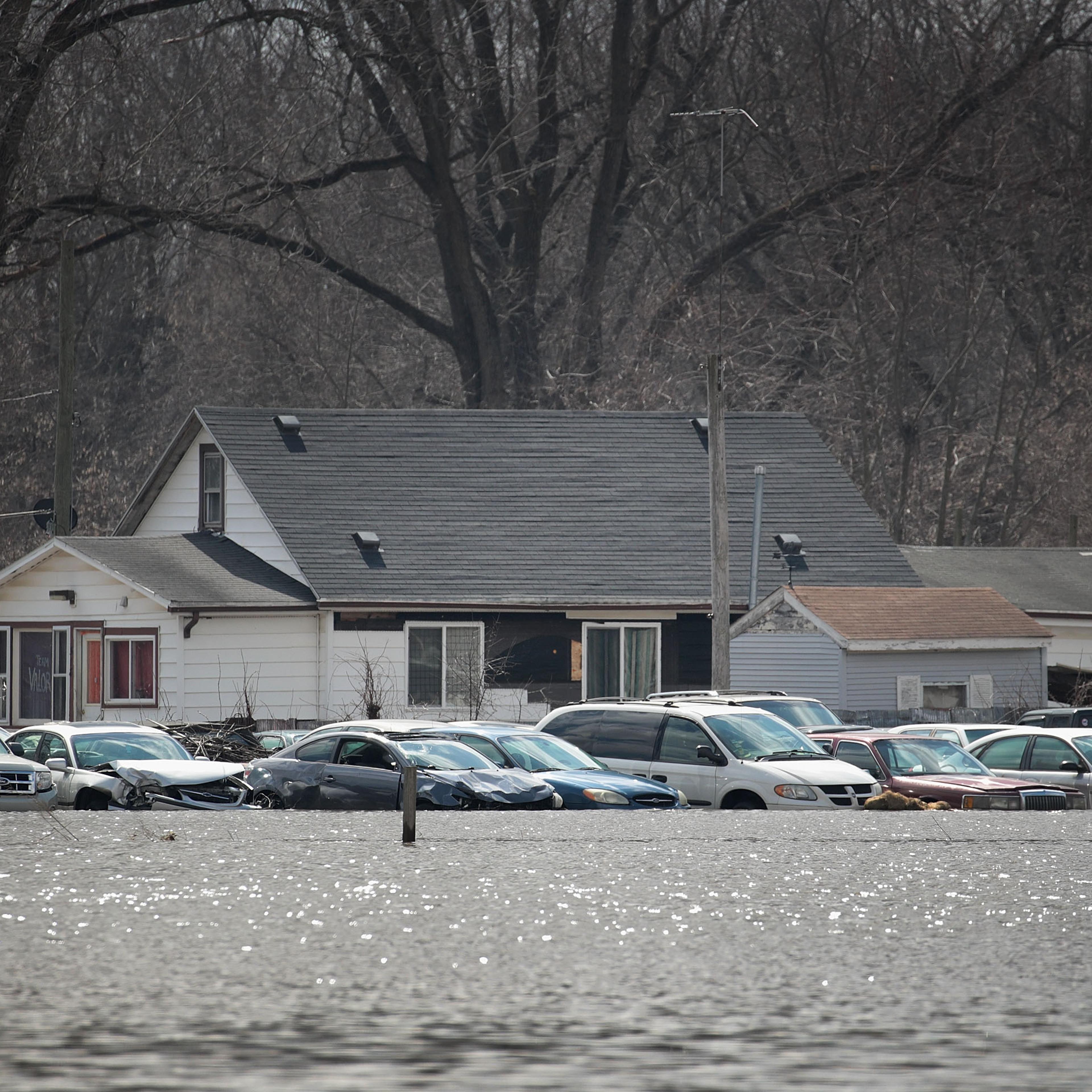 After Heavy Snows, Midwest Rivers Flood Their Banks