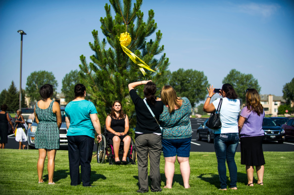 Hope for Aurora ceremony where trees were planted at The Potter's House of Denver in commemoration of those lost in the 2012 Aurora Shooting.