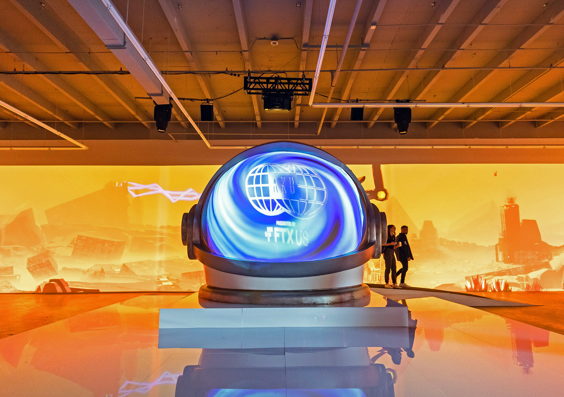 A giant space helmet inside the pop-up Aku World.