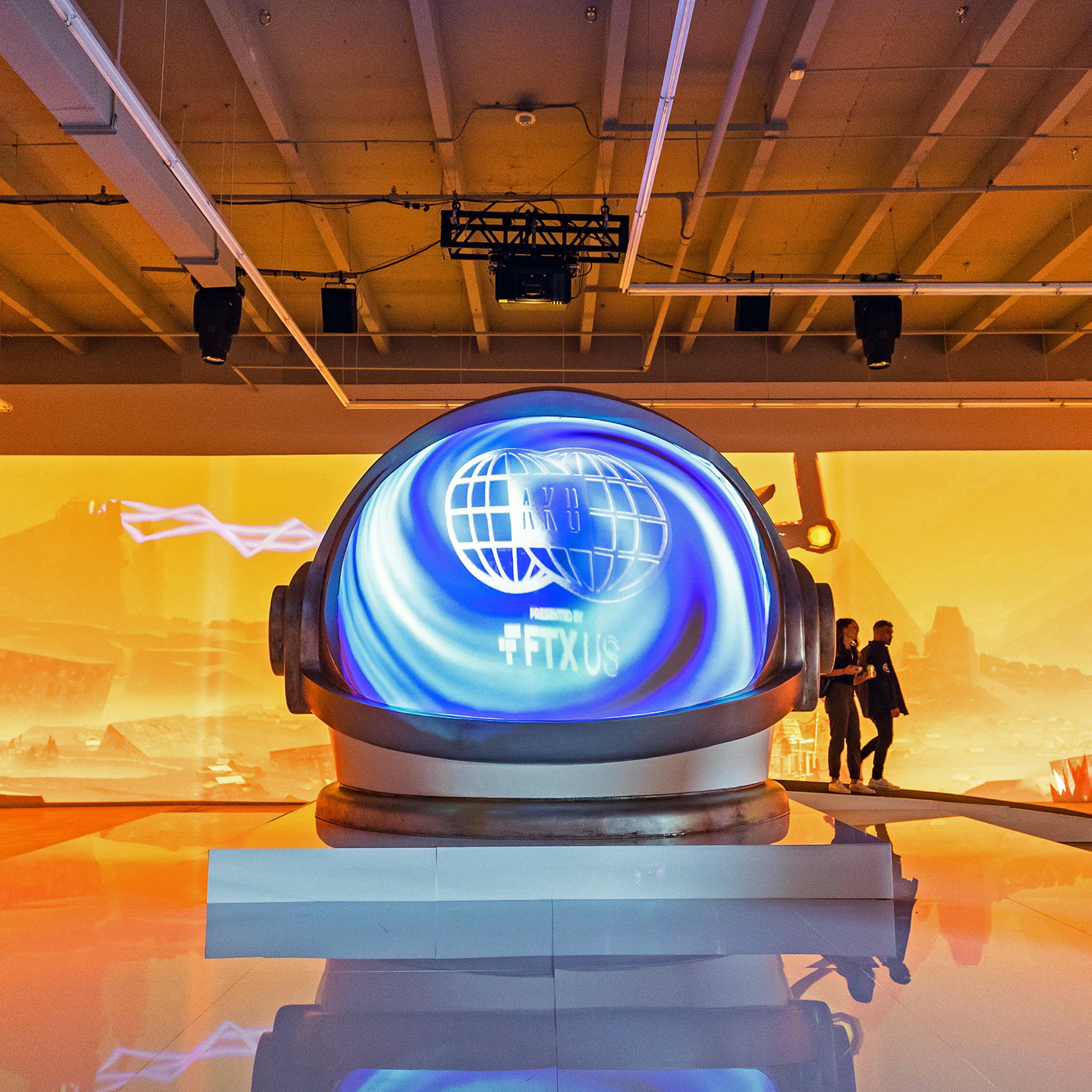 A giant space helmet inside the pop-up Aku World.