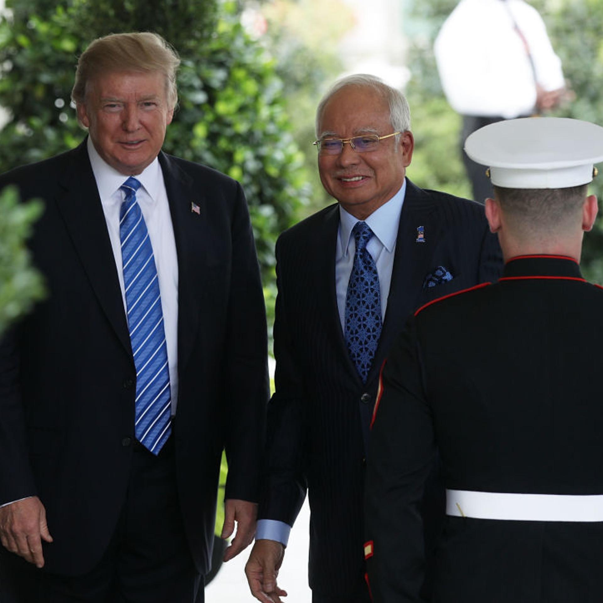 U.S. President Donald Trump welcomes Malaysian Prime Minister Najib Razak outside the West Wing of the White House in Washington, D.C., on Sept. 12, 2017.