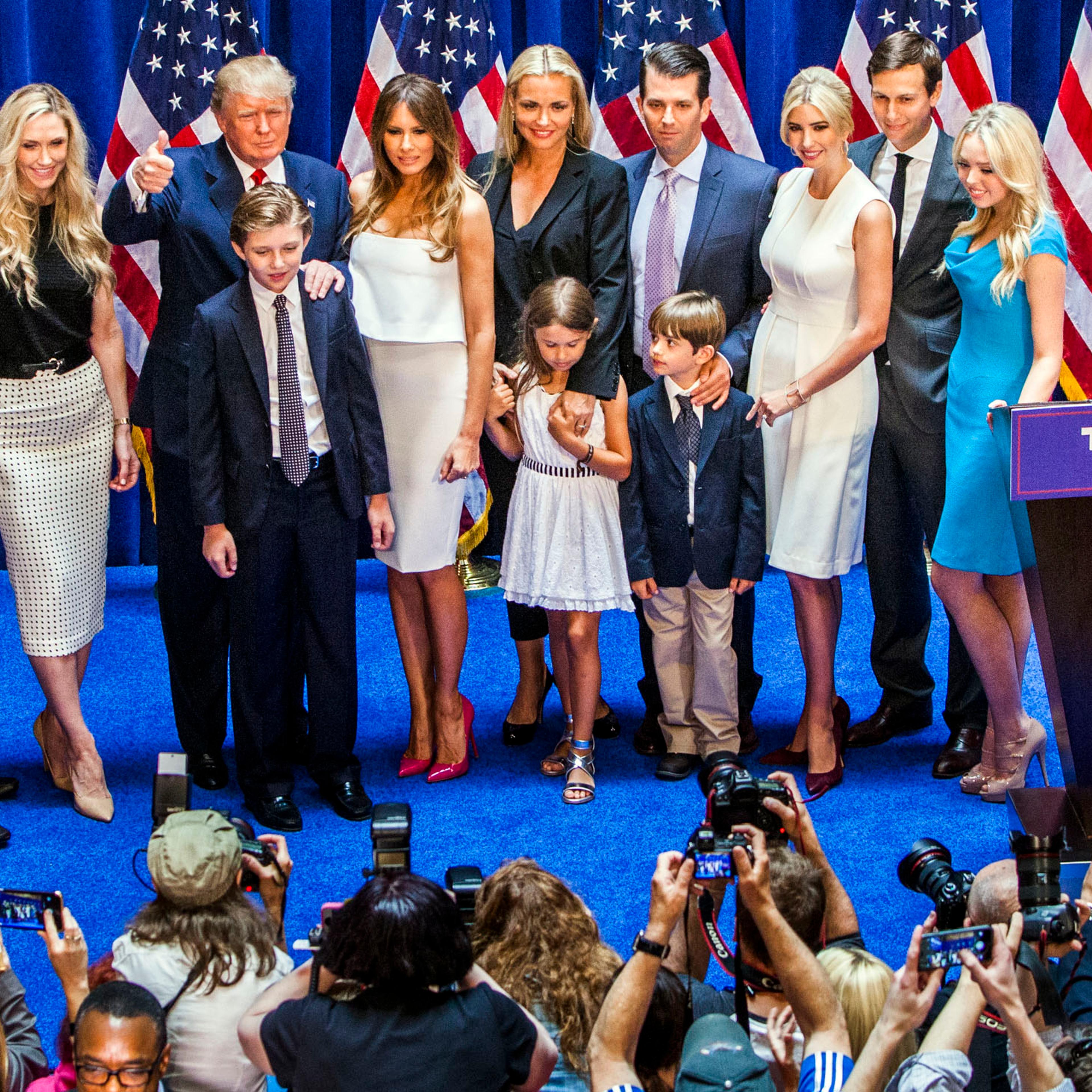 From left, Eric Trump, Lara Yunaska Trump, Donald Trump, Barron Trump, Melania Trump, Vanessa Haydon Trump, Kai Madison Trump, Donald Trump Jr., Donald John Trump III, Ivanka Trump, Jared Kushner and Tiffany Trump appear on stage after Donald Trump annou