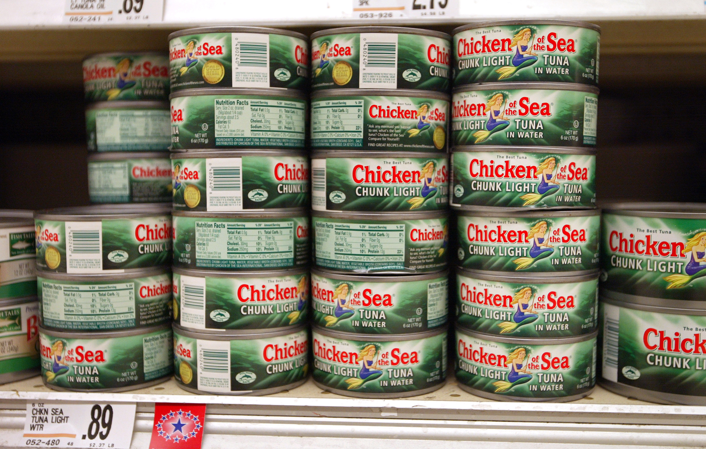 Cans of "Chicken of the Sea" tuna fish are seen in a grocery store in Zion, Illinois on Dec. 12, 2003.