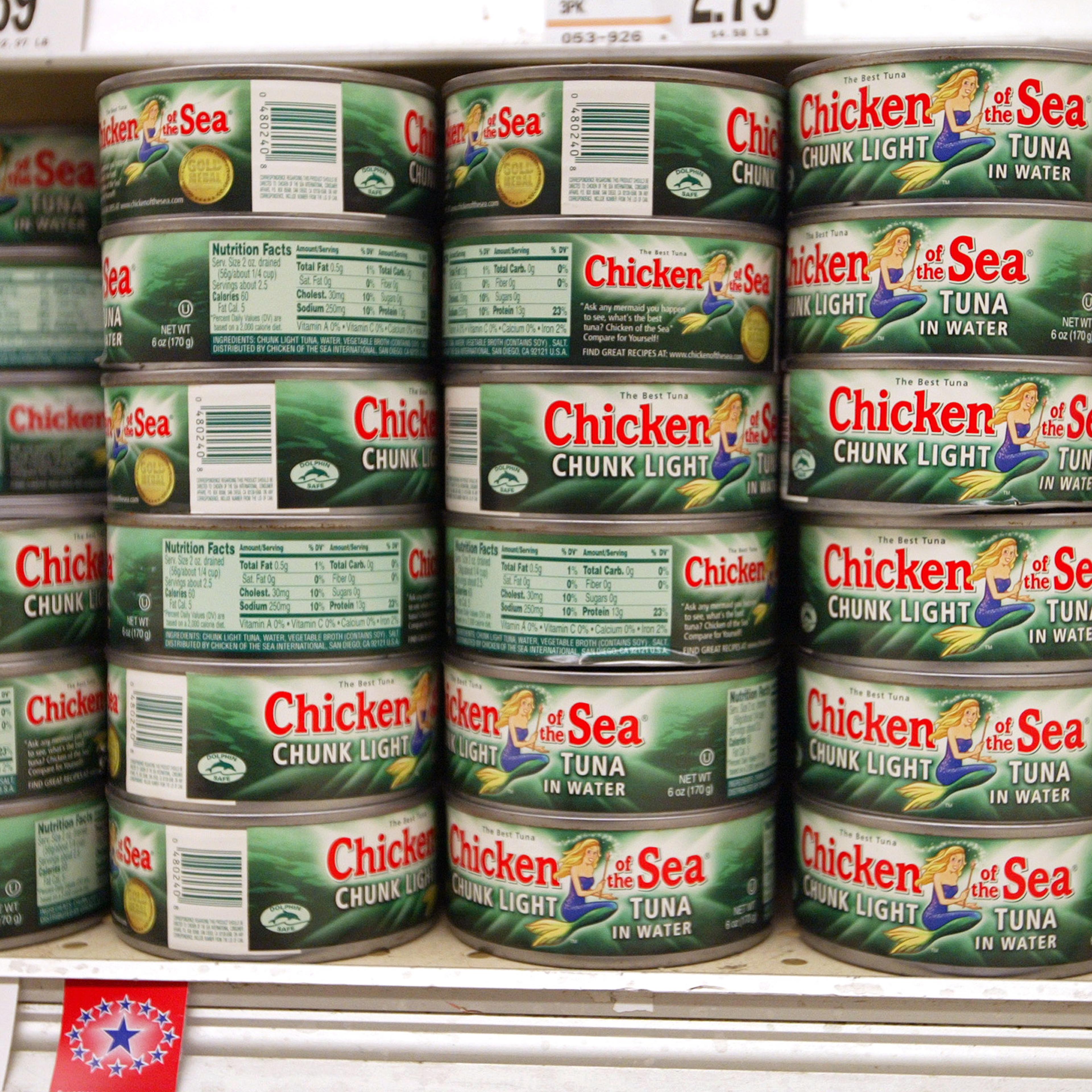 Cans of "Chicken of the Sea" tuna fish are seen in a grocery store in Zion, Illinois on Dec. 12, 2003.