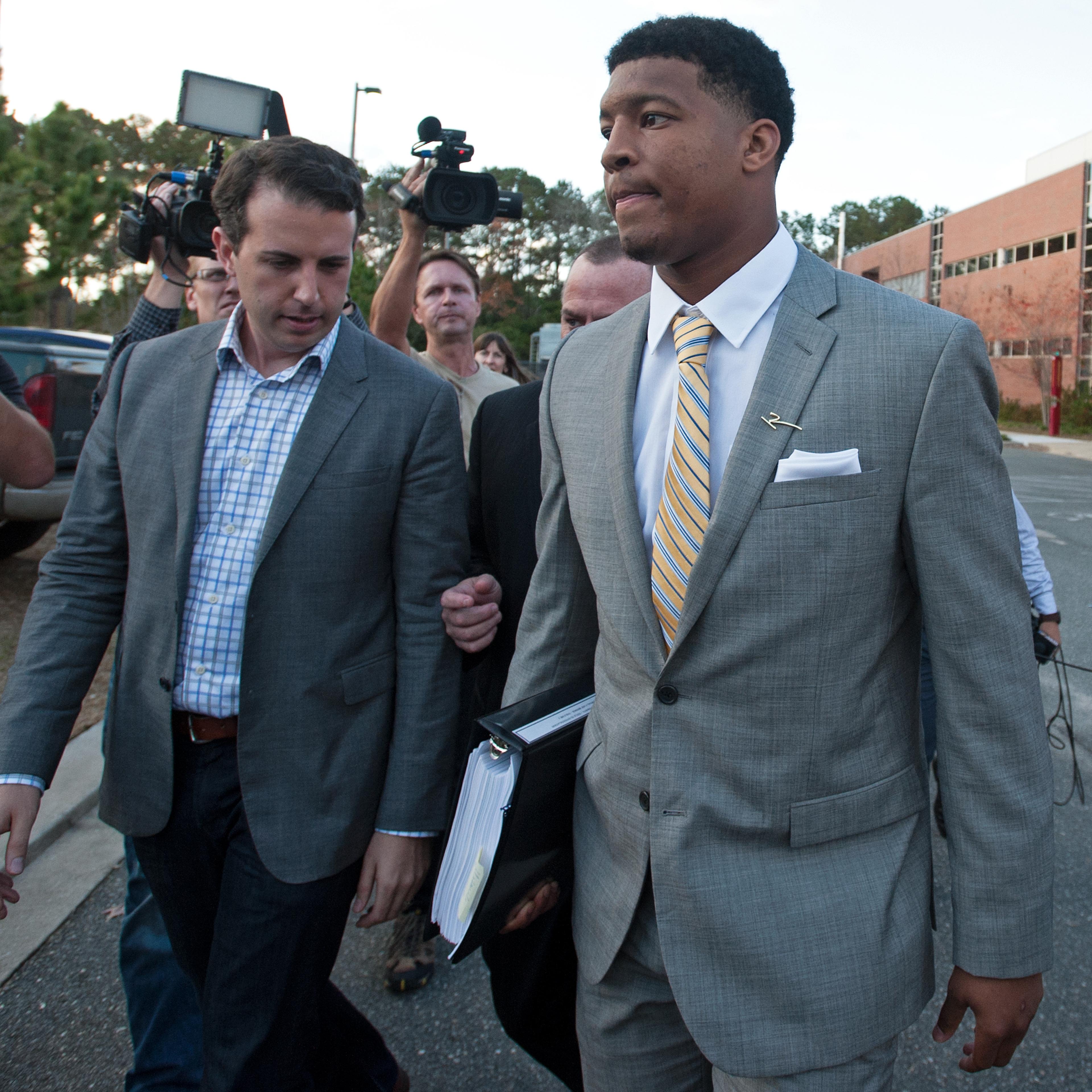 Florida State Seminoles quaterback Jameis Winston leaves his student conduct code hearing in Tallahassee, Florida on Dec. 2, 2014.