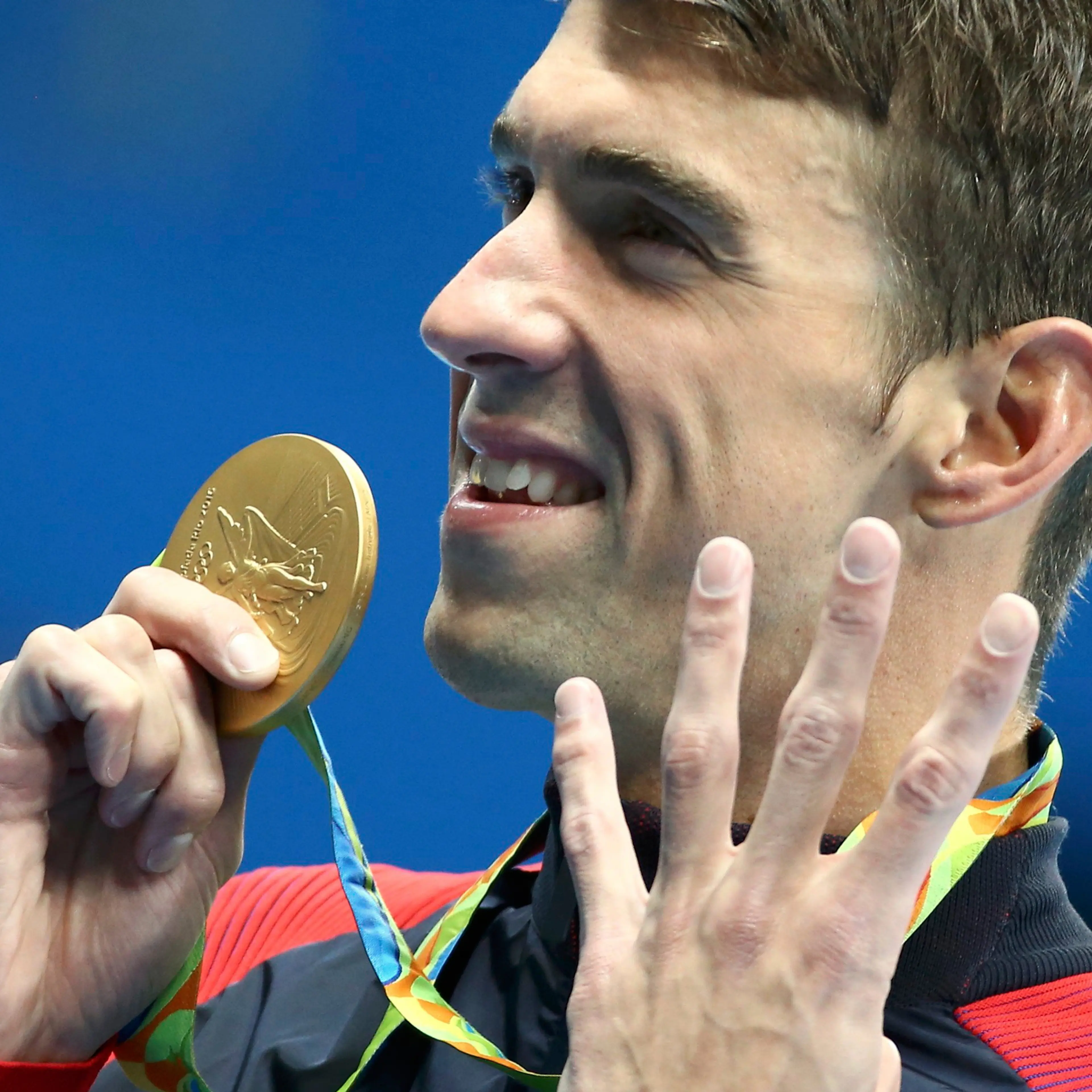 2016 Rio Olympics - Swimming - Victory Ceremony - Men's 200m Individual Medley Victory Ceremony - Olympic Aquatics Stadium - Rio de Janeiro, Brazil - 11/08/2016. Michael Phelps (USA) of USA poses with his gold medal. REUTERS/Michael Dalder FOR EDITORIAL