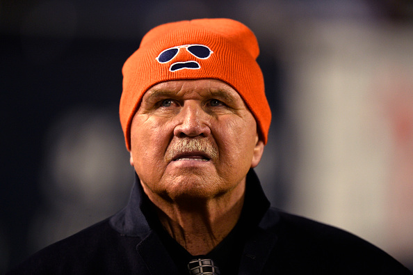 Former head coach and tight end Mike Ditka of the Chicago Bears stands on the field during a game against the New Orleans Saints at Soldier Field in Chicago on Dec. 15, 2014