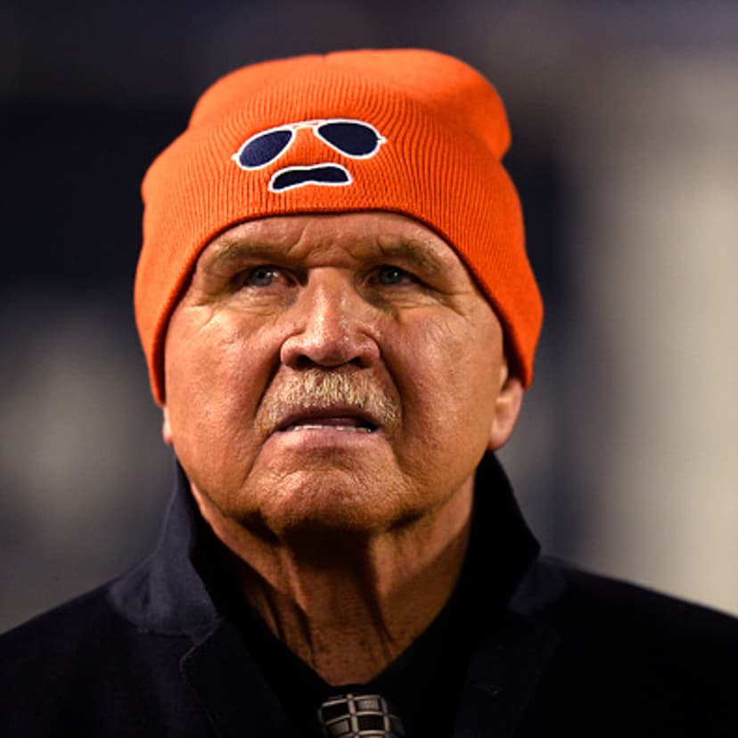 Former head coach and tight end Mike Ditka of the Chicago Bears stands on the field during a game against the New Orleans Saints at Soldier Field in Chicago on Dec. 15, 2014