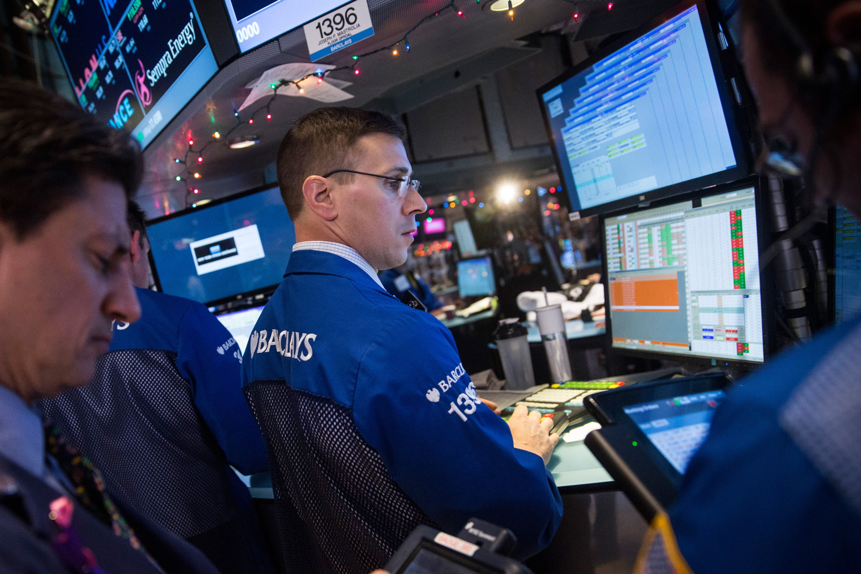 Traders work on the floor of the New York Stock Exchange.