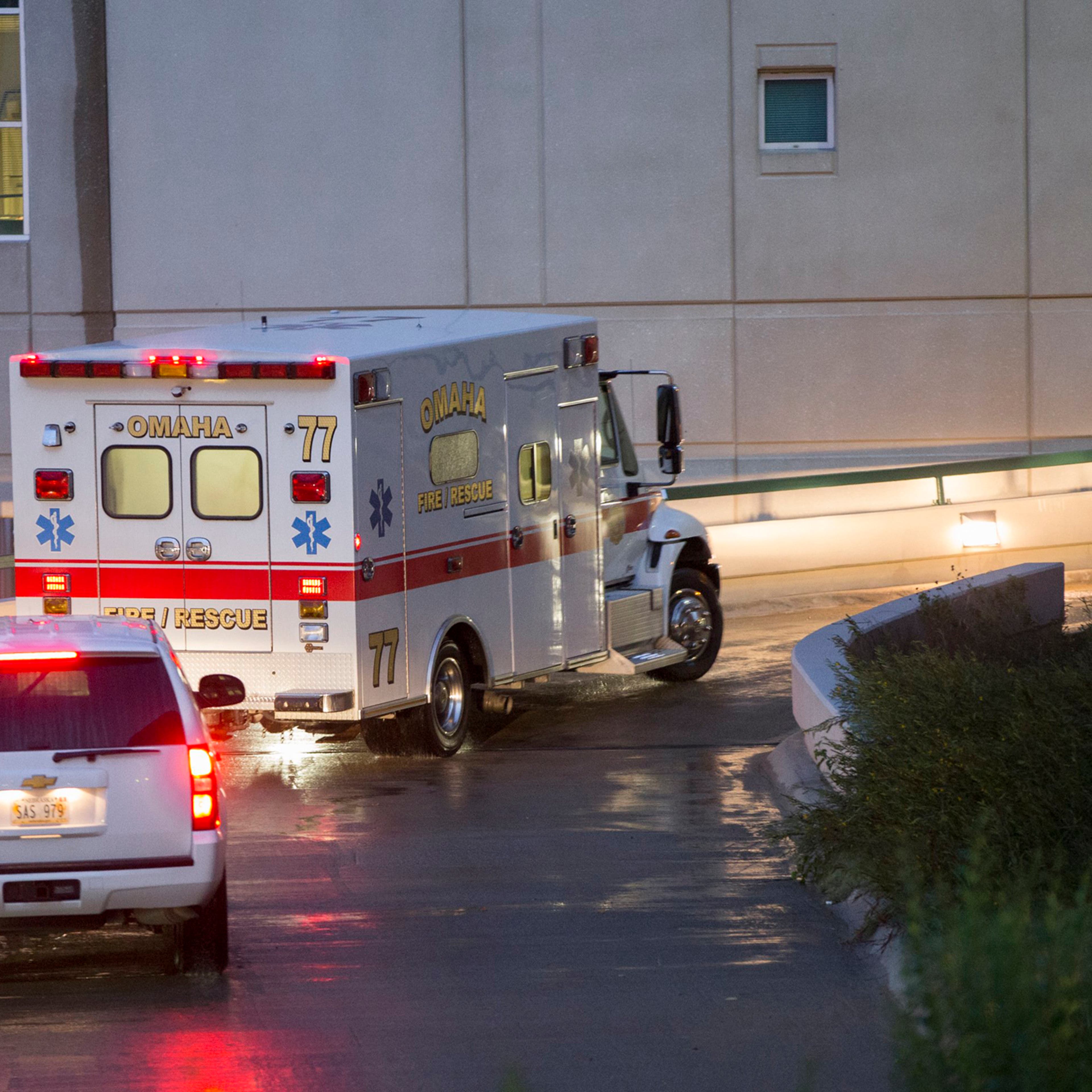 The ambulance transporting Dr. Rick Sacra, 51, who was infected with Ebola while serving as an obstetrician in Liberia, arrives to the Nebraska Medical Center in Omaha, Neb., Sept. 5, 2014.