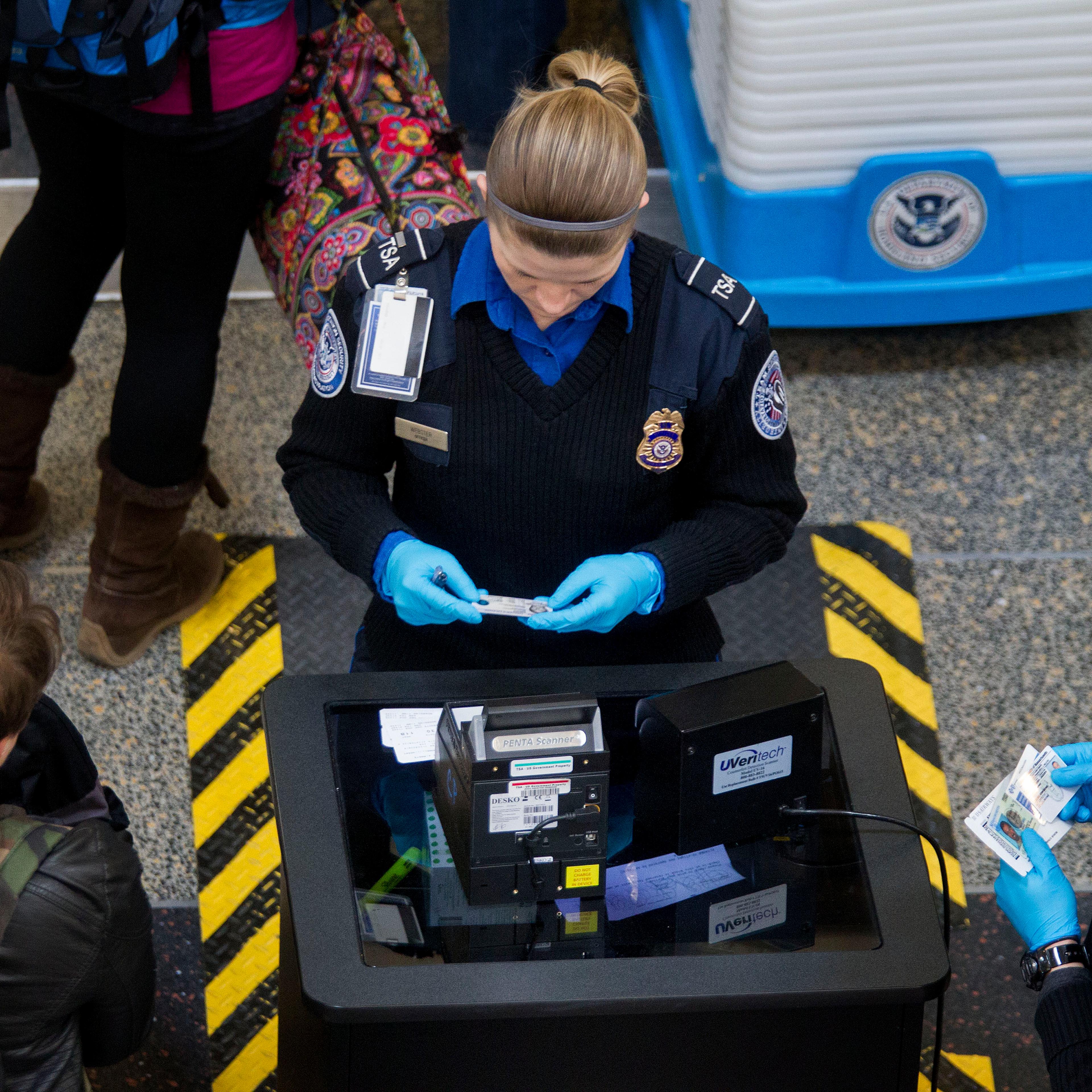 TSA Officers Work As Homeland Security Shutdown Nears Amid Immigration Impasse
