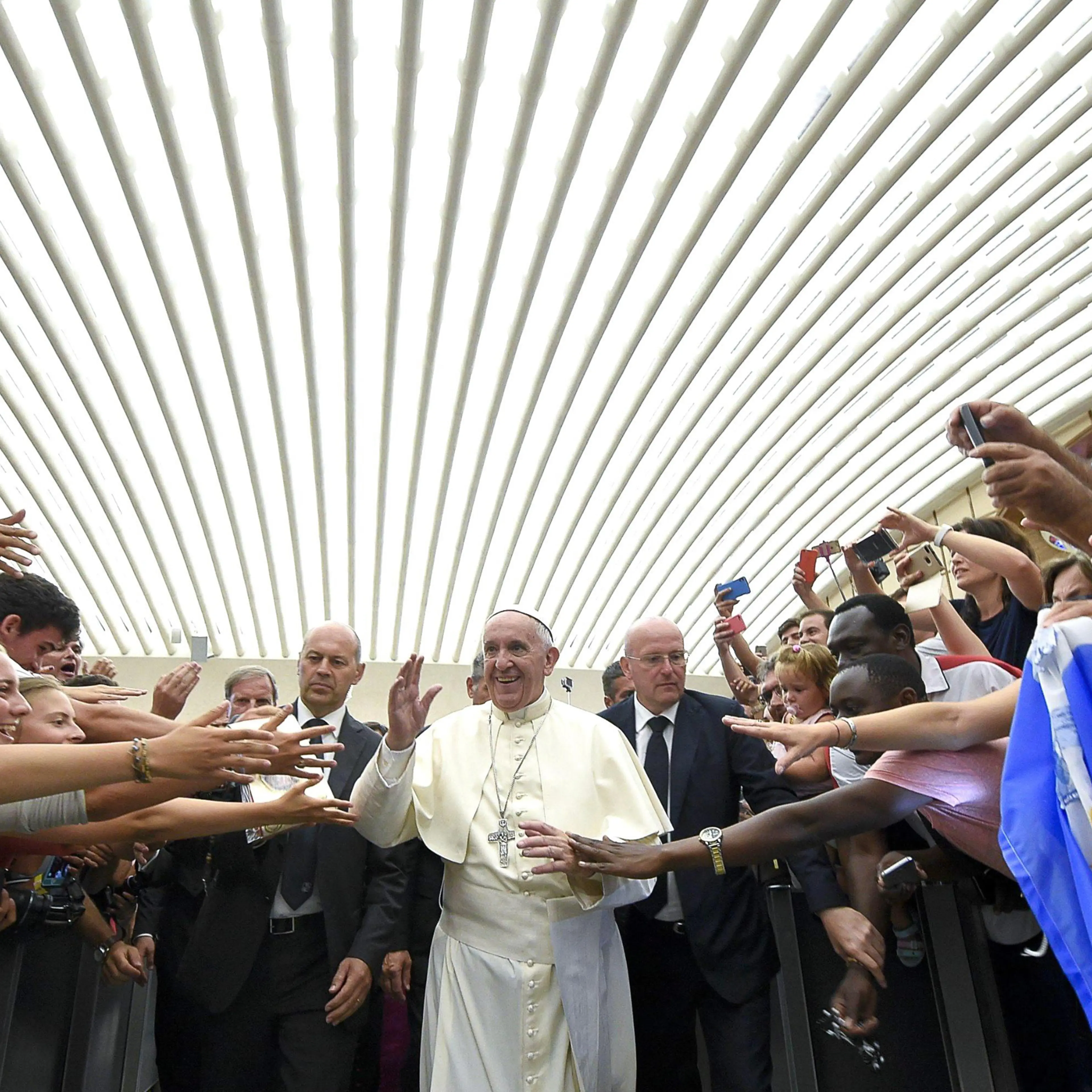Pope Francis greeting faithful during his weekly general audience, in the Paul VI Hall, Vatican City, on Aug. 03, 2016.