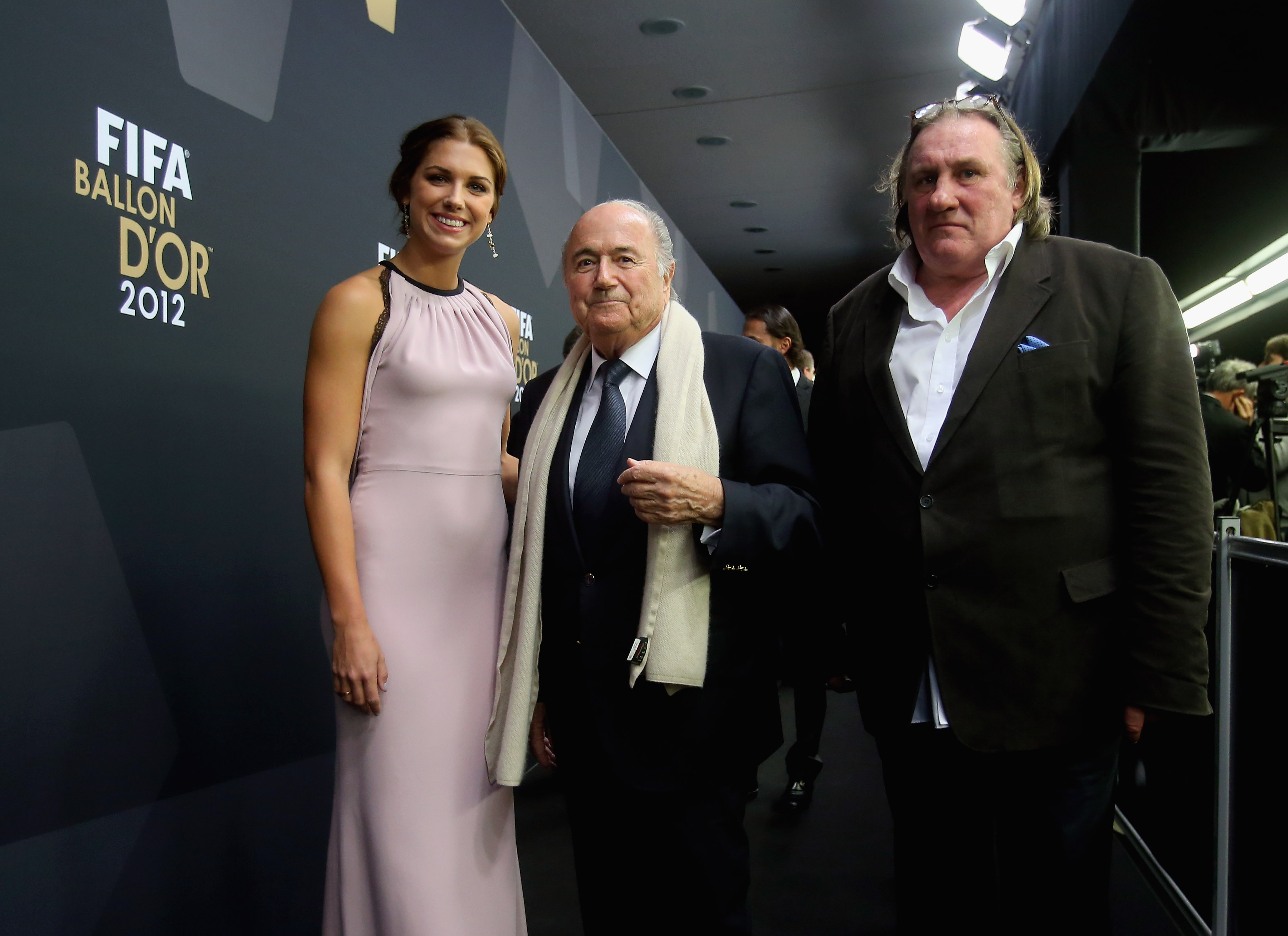 FIFA president Joseph S. Blatter, Alex Morgan and French actor Gerard Depardieu during the red carpet arrivals at the FIFA Ballon d'Or Gala 2012 at the Kongresshaus on Jan. 7, 2013 in Zurich.