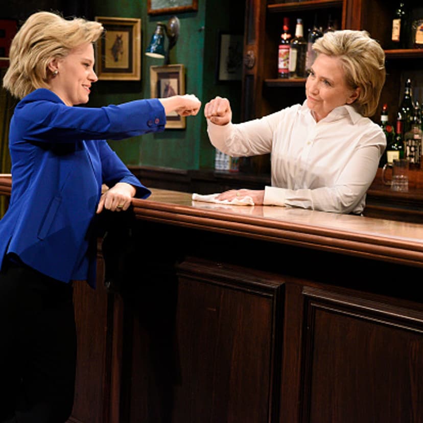 Kate McKinnon as Hillary Clinton and Hillary Clinton a Val during the "Bar Talk" sketch on October 3, 2015.