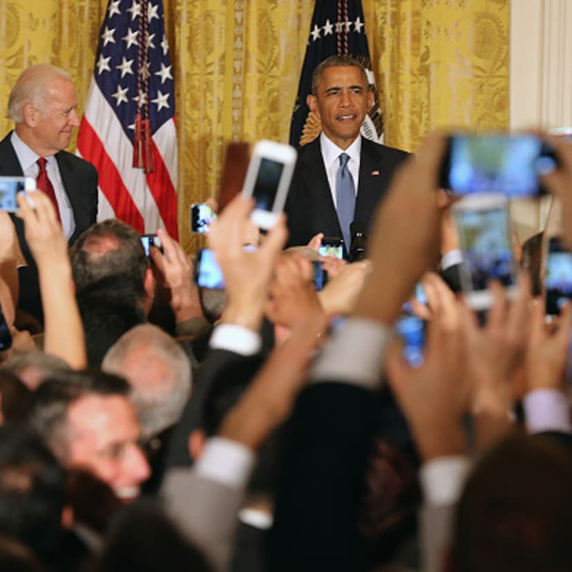 U.S. President Barack Obama (R) and Vice President Joe Biden attend a reception for LGBT Pride Month in the East Room of the White House June 24, 2015 in Washington, DC.