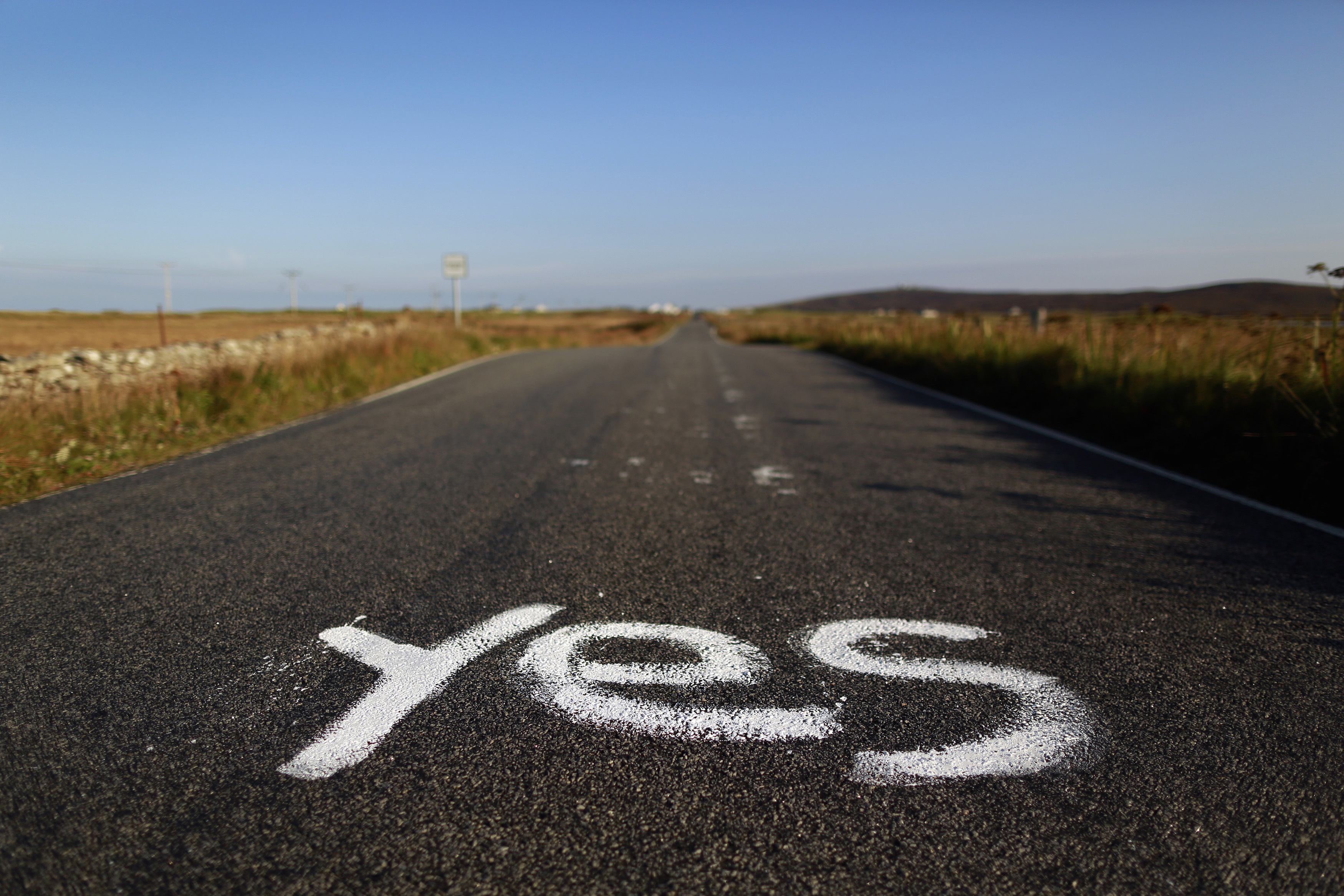 Graffiti supporting the "Yes" campaign is painted on a road in North Uist in the Outer Hebrides