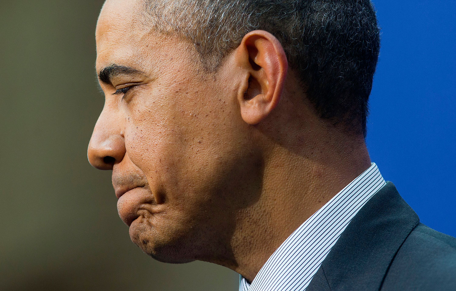 President Barack Obama pauses before answering a question during a joint news conference with Dutch Prime Minister Mark Rutte at the conclusion of the Nuclear Security Summit in The Hague, Netherlands, March 25, 2014.