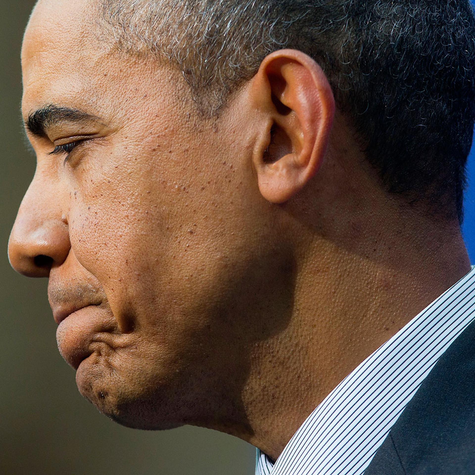 President Barack Obama pauses before answering a question during a joint news conference with Dutch Prime Minister Mark Rutte at the conclusion of the Nuclear Security Summit in The Hague, Netherlands, March 25, 2014.