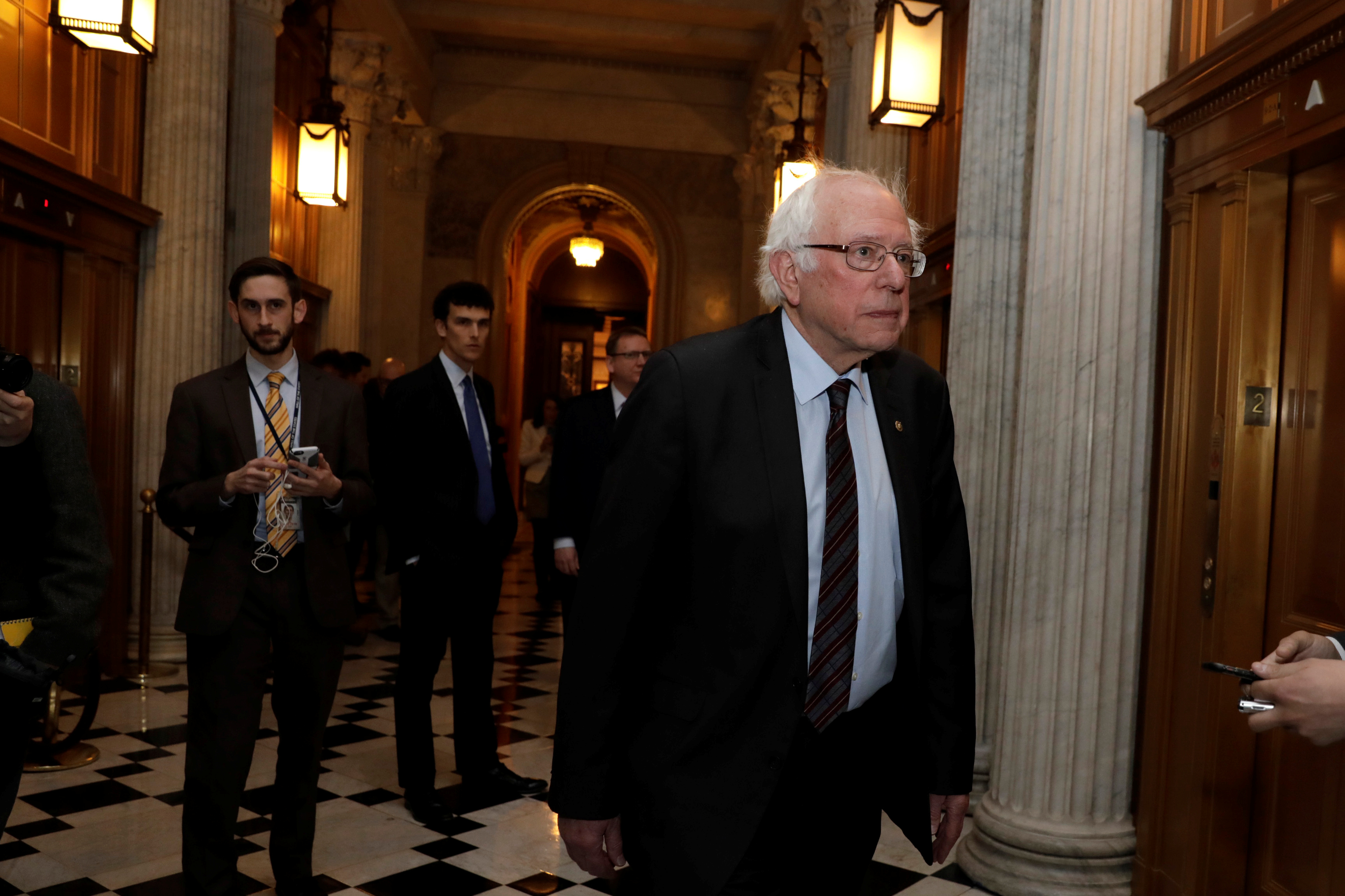 Senator Bernie Sanders arrives at Democratic Party caucus meeting