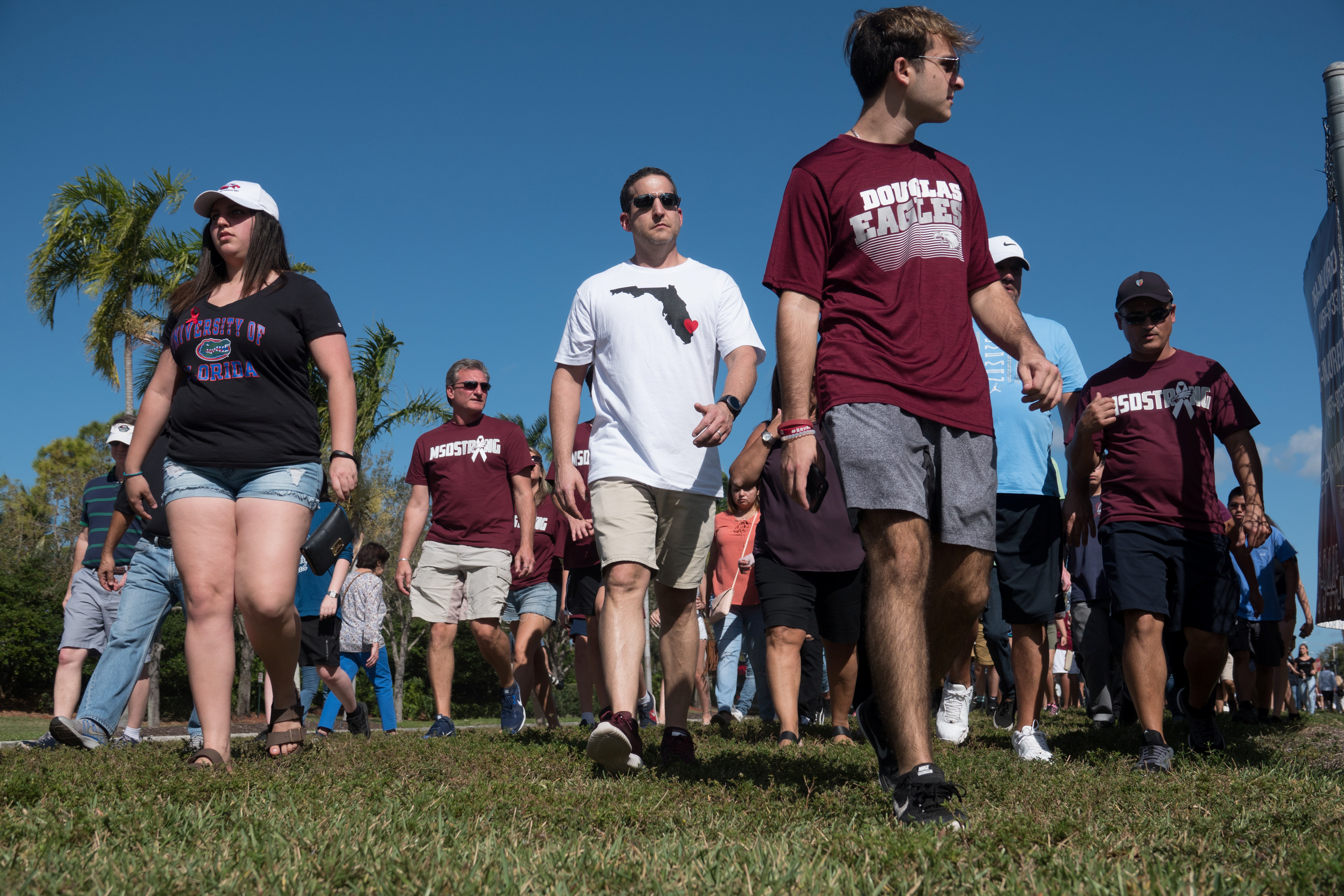 Students and parents arrive for campus orientation at Marjory Stoneman Douglas High in Parkland