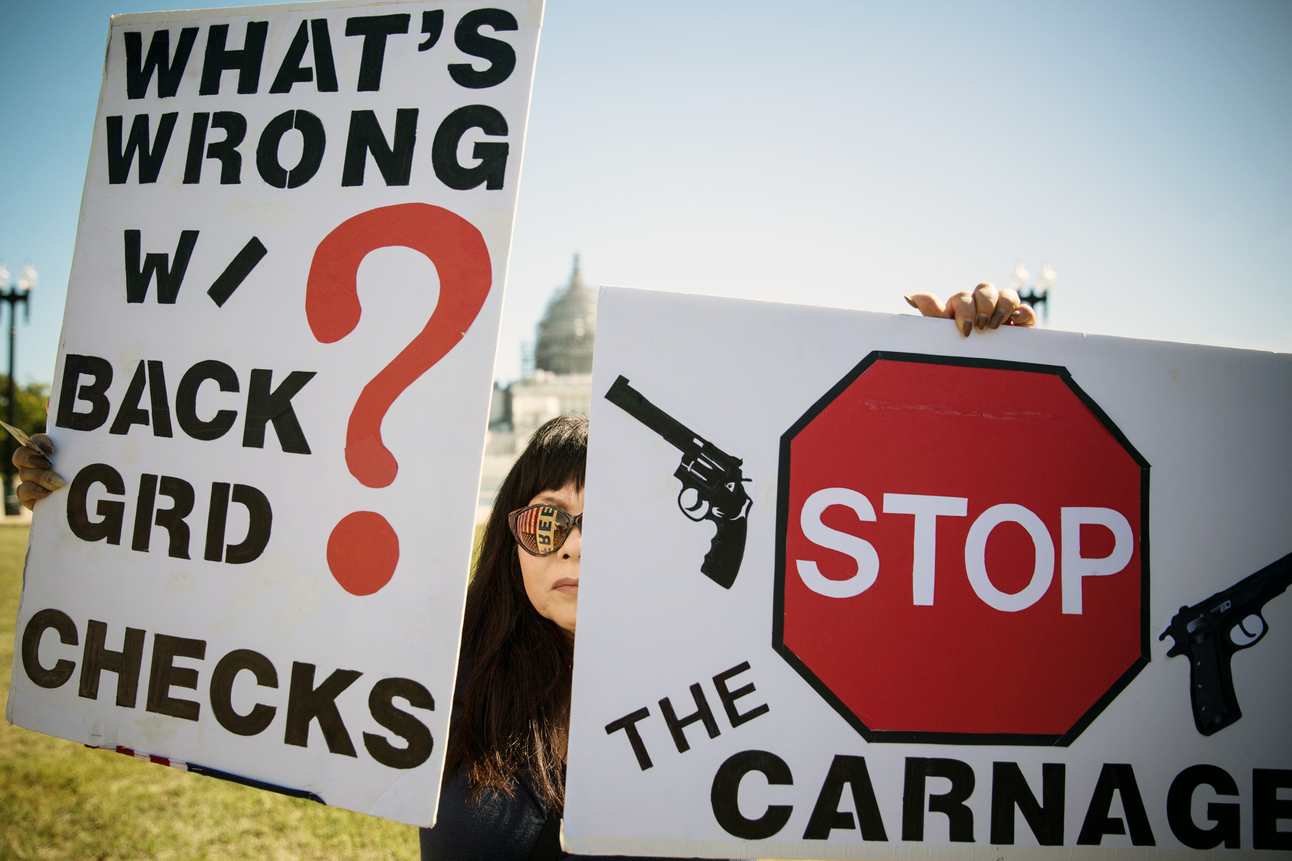Protesters call for the prevention of gun violence during a demonstration on Capitol Hill to call on Congress to vote on sensible gun reform.
