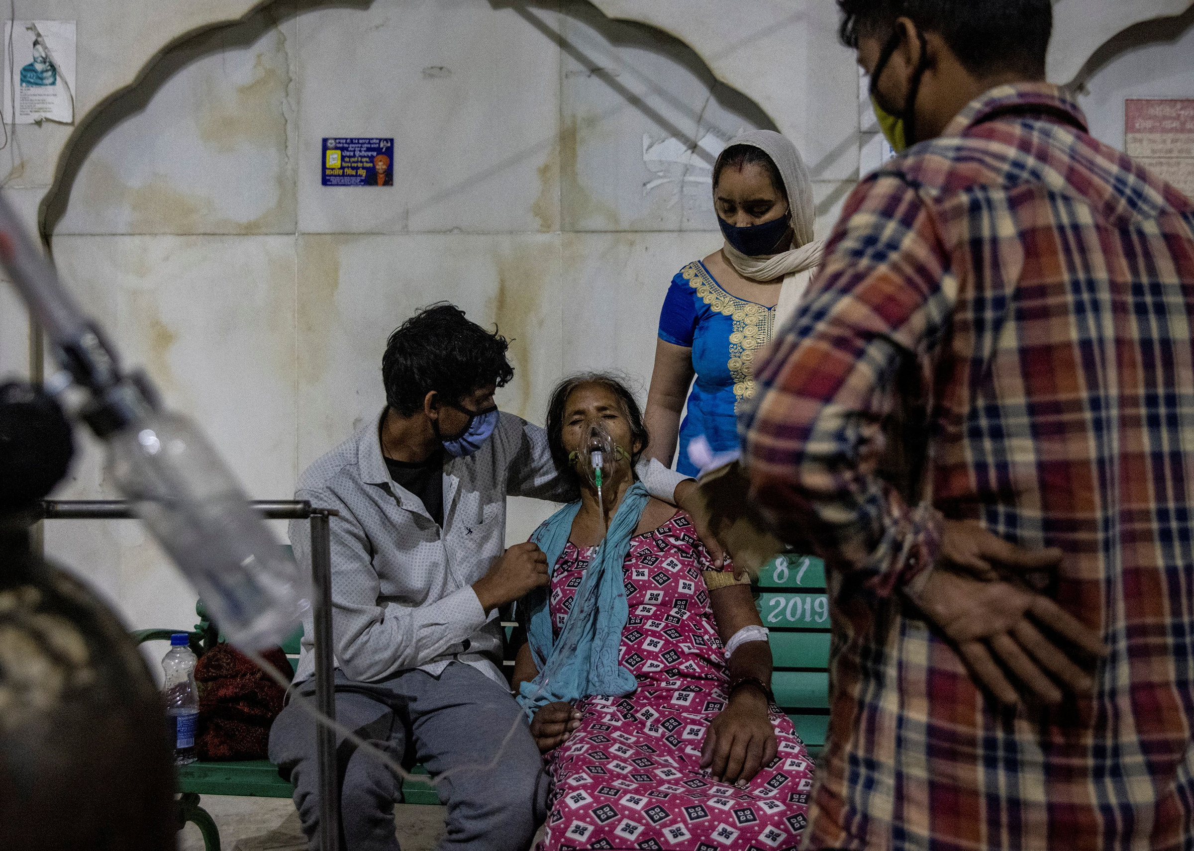 A woman receives free oxygen support at a Sikh temple in Ghaziabad, India, on April 24, 2021.