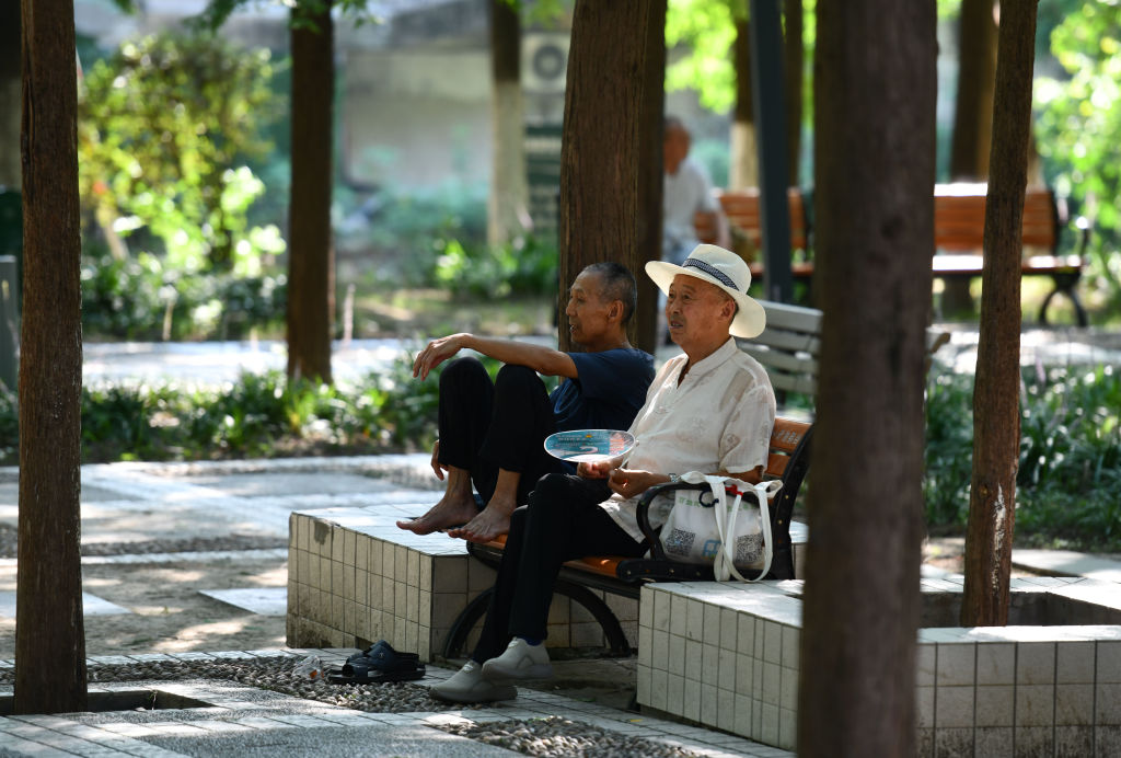 Senior citizens relax at a park in Fuyang, China, on July 22, 2024.