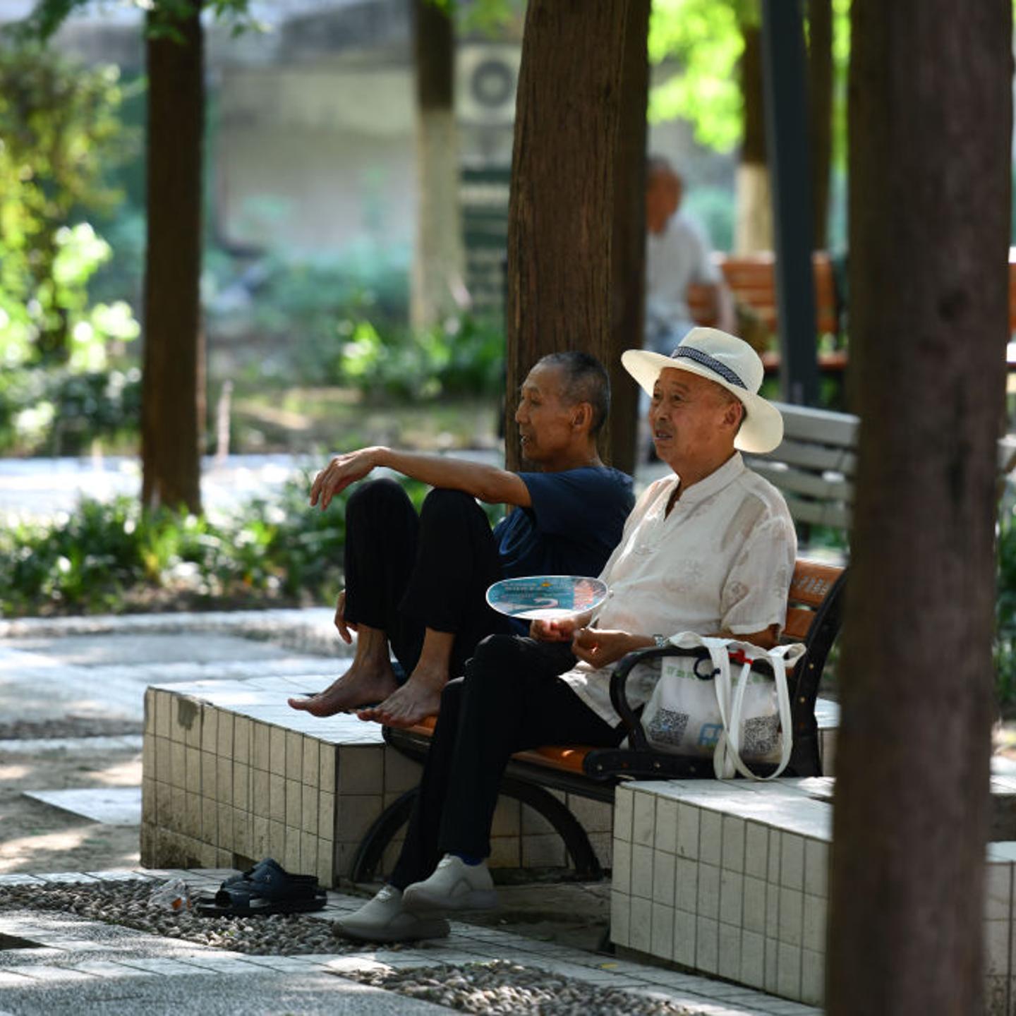 Senior citizens relax at a park in Fuyang, China, on July 22, 2024.