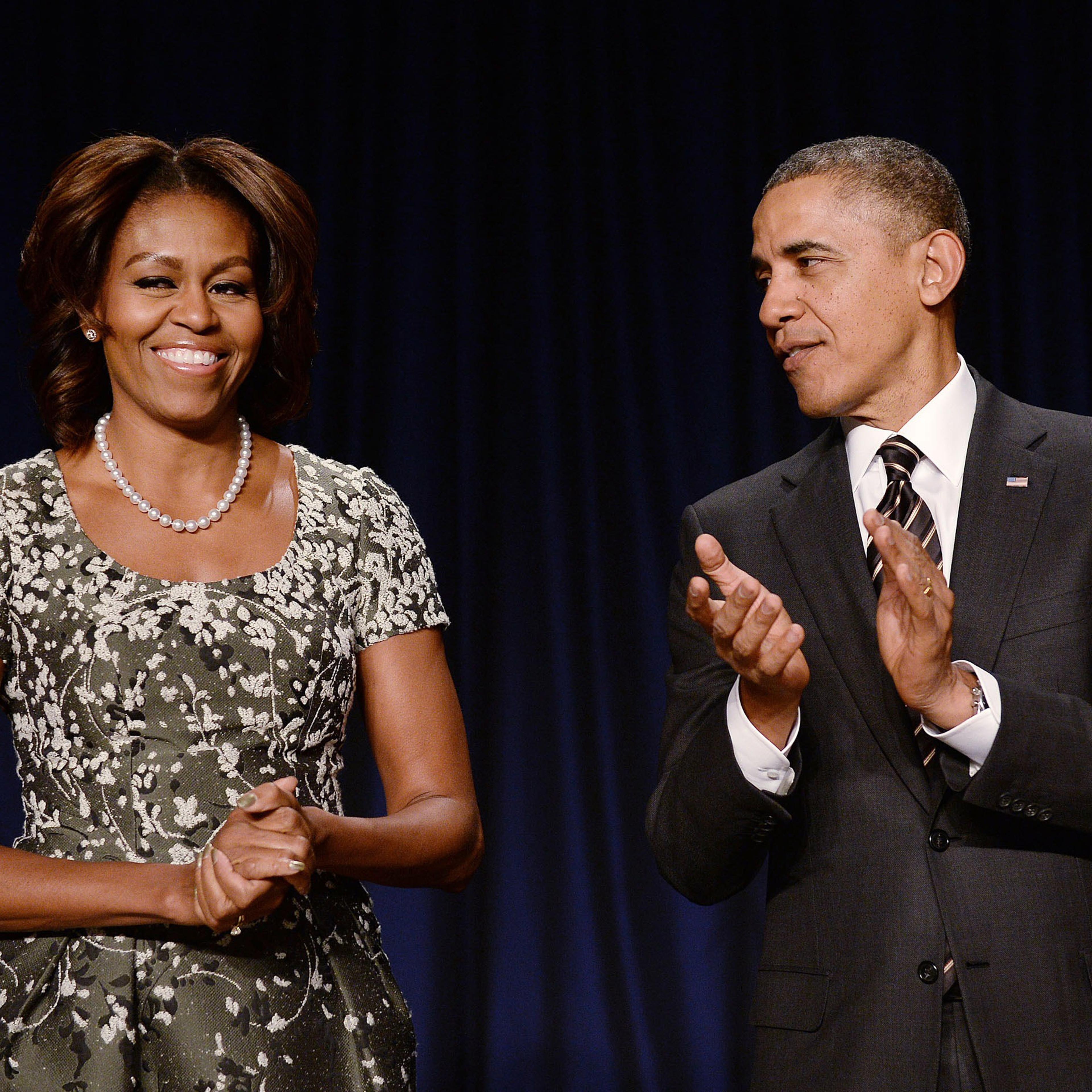 President Barack Obama and first lady Michelle Obama attend the National Prayer Breakfast at the Washington Hilton on Feb. 6, 2014 in Washington.