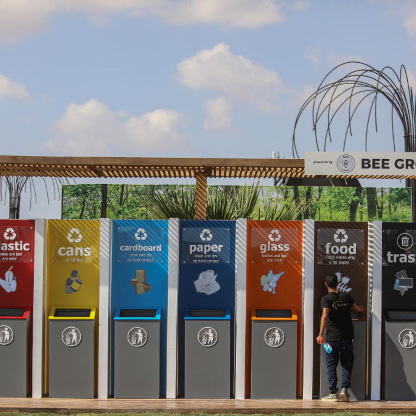 Seven different types of trash bins—including plastic cans, food and general trash—at the 2022 UN climate conference