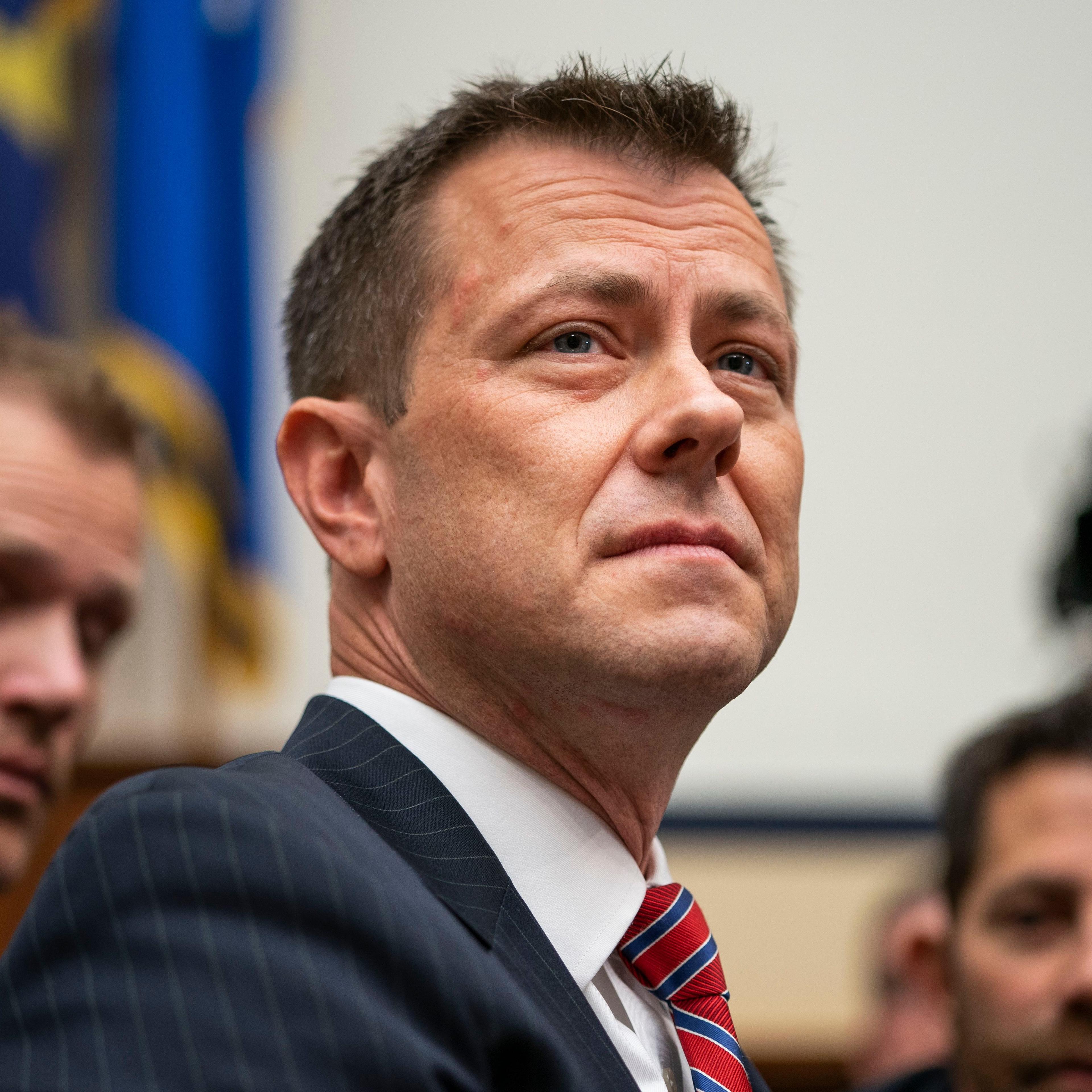 A close-up of Deputy Assistant FBI Director Peter Strzok, looking up as he begins to testify