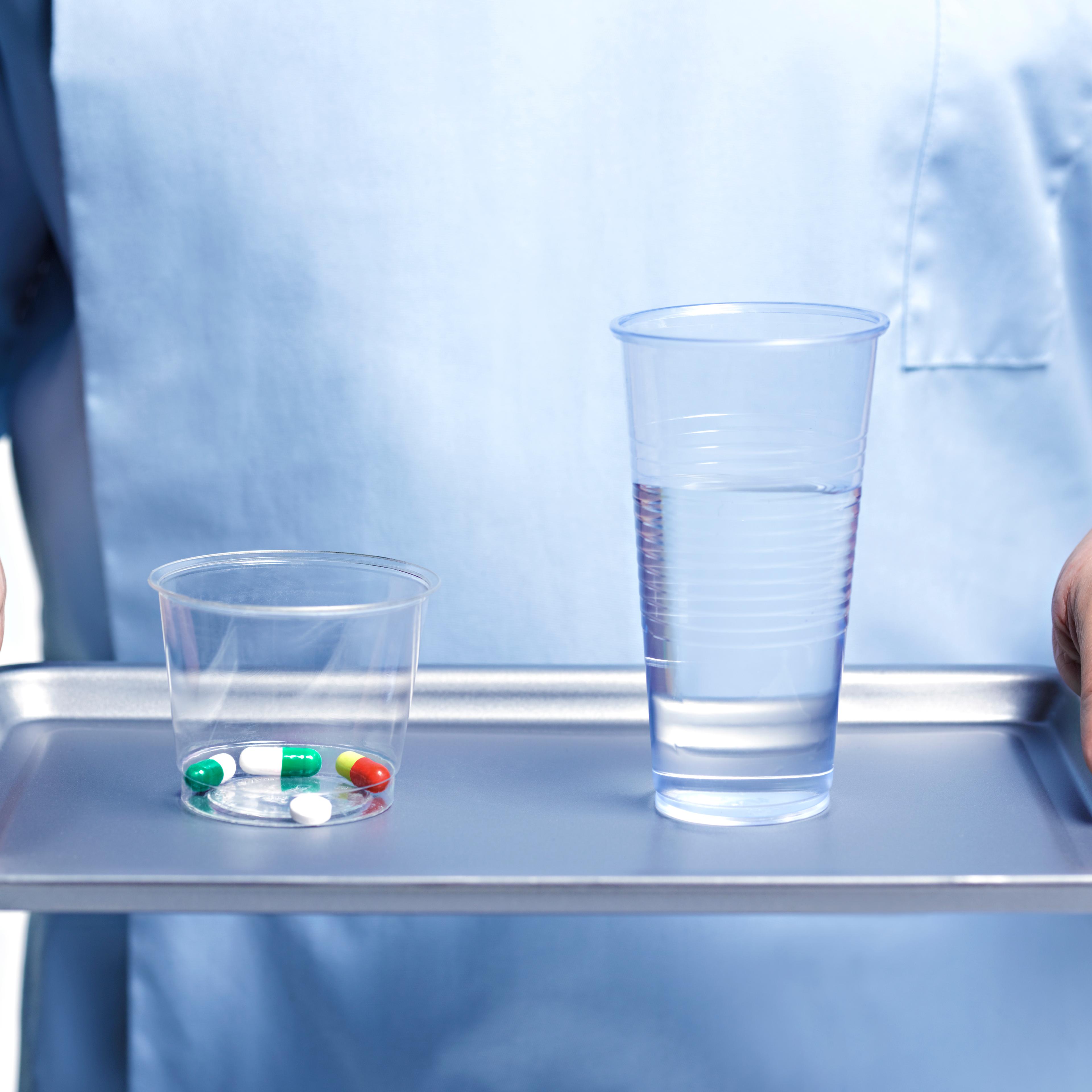 Nurse bringing medication
